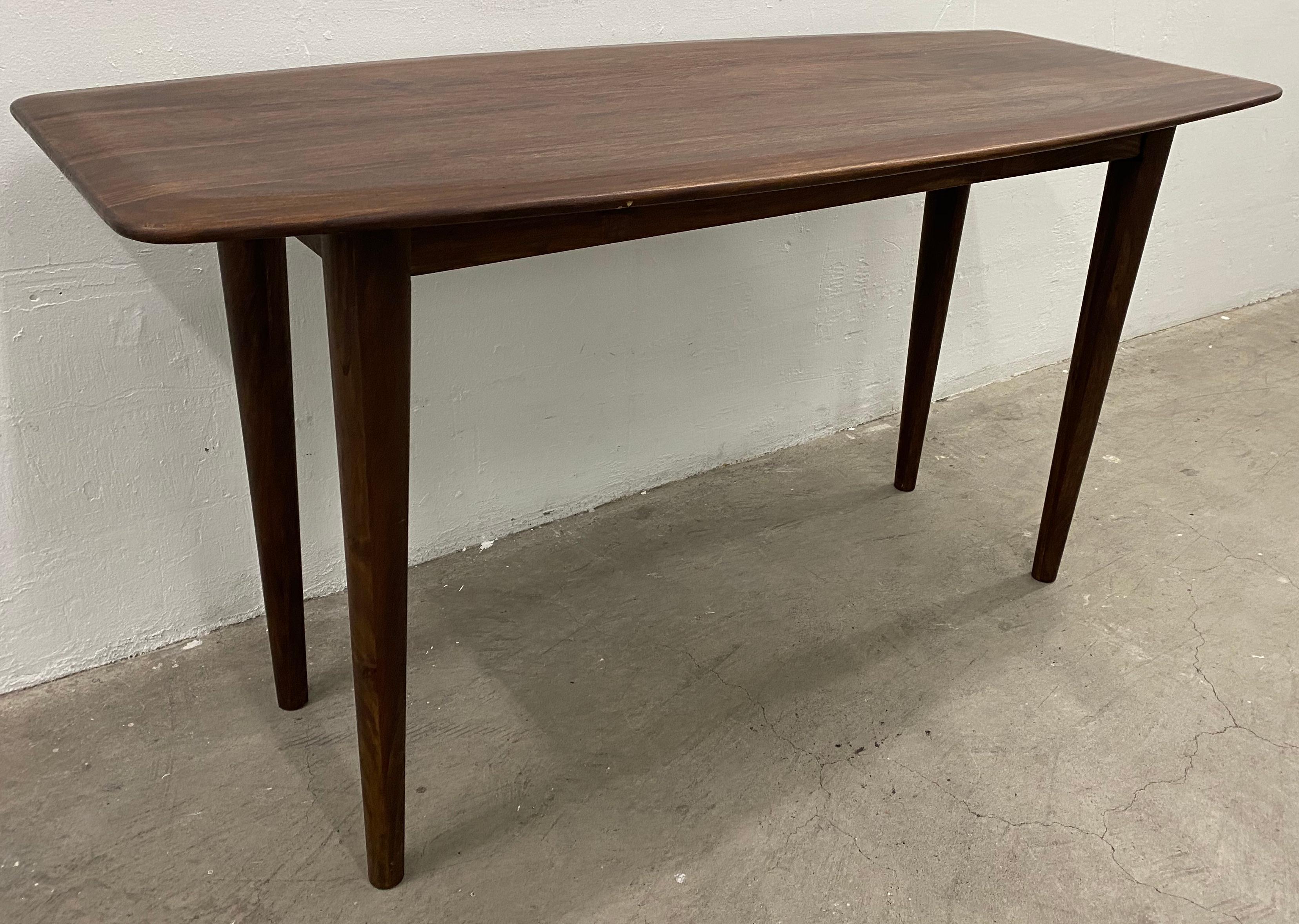 Contemporary walnut table for console dining or desk

Great dimensions for smaller dining spaces

This will also make a fine desk or console table

Dimensions 56