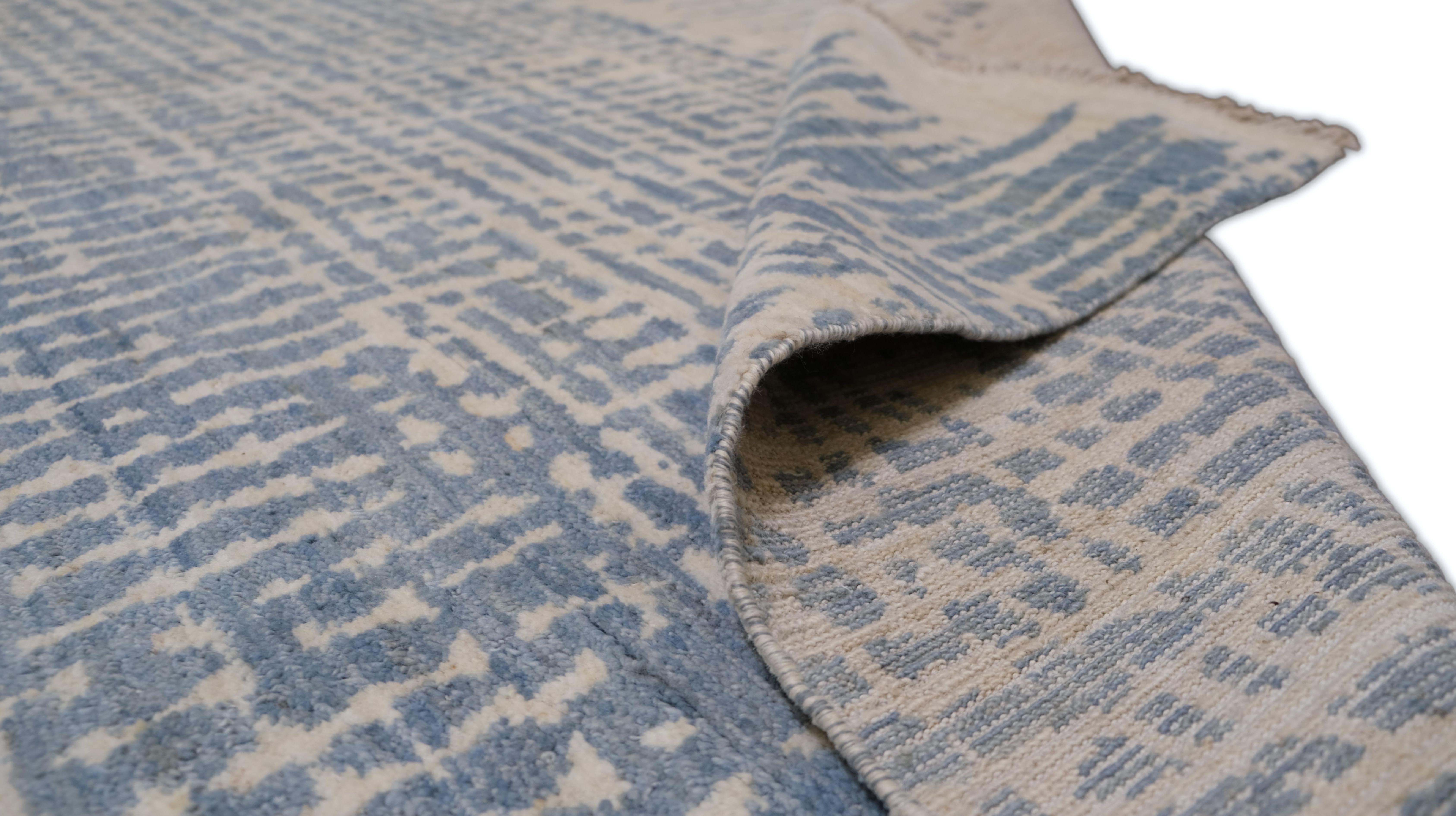Noué à la main Tapis de laine bleu et ivoire Contemporary Waterworks 8'8''x12'' (en anglais) en vente