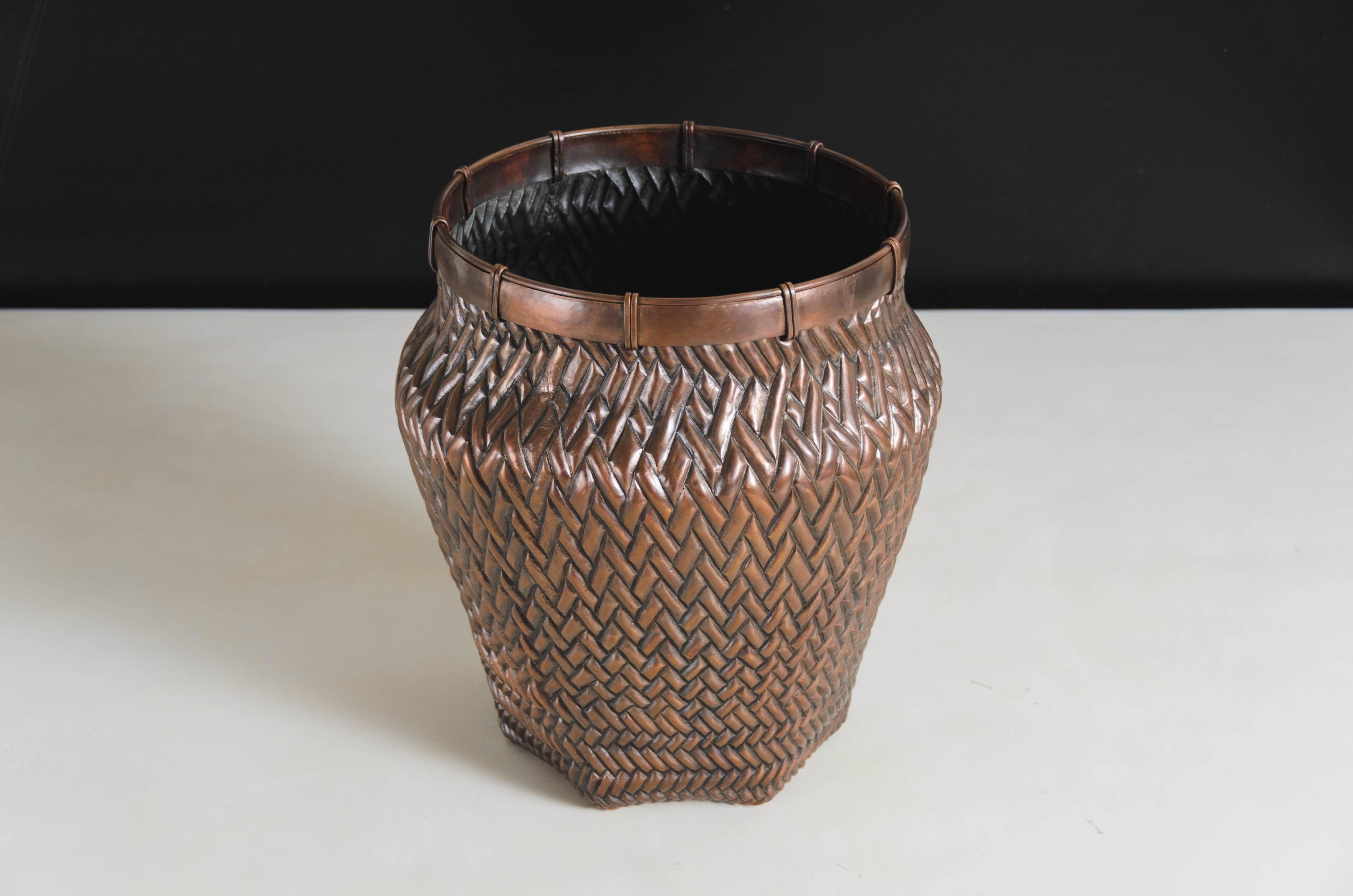 Weave design vase
Antique copper
Hand Repoussé
Limited edition
Each piece is individually crafted and is unique. 
Use liner for floral arrangement
Repoussé is the traditional art of hand-hammering decorative relief onto sheet metal. The