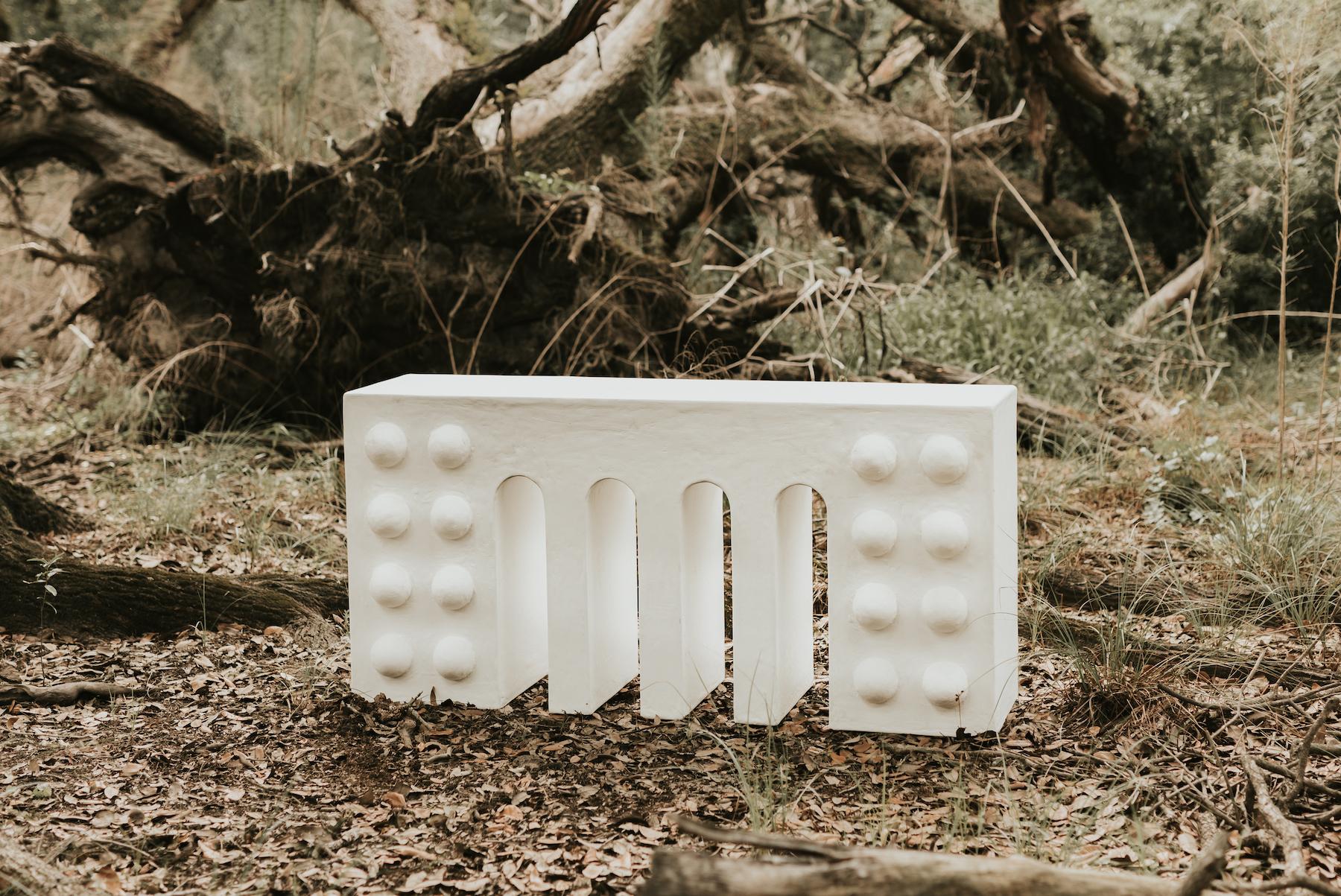 Console table
158 x 41 x 76 cm

The Wendon Console Table is both functional and decorative, thanks to its solid yet harmonious silhouette and use of natural materials. Perfect for an entryway or dining room, the entire piece is covered in a complex