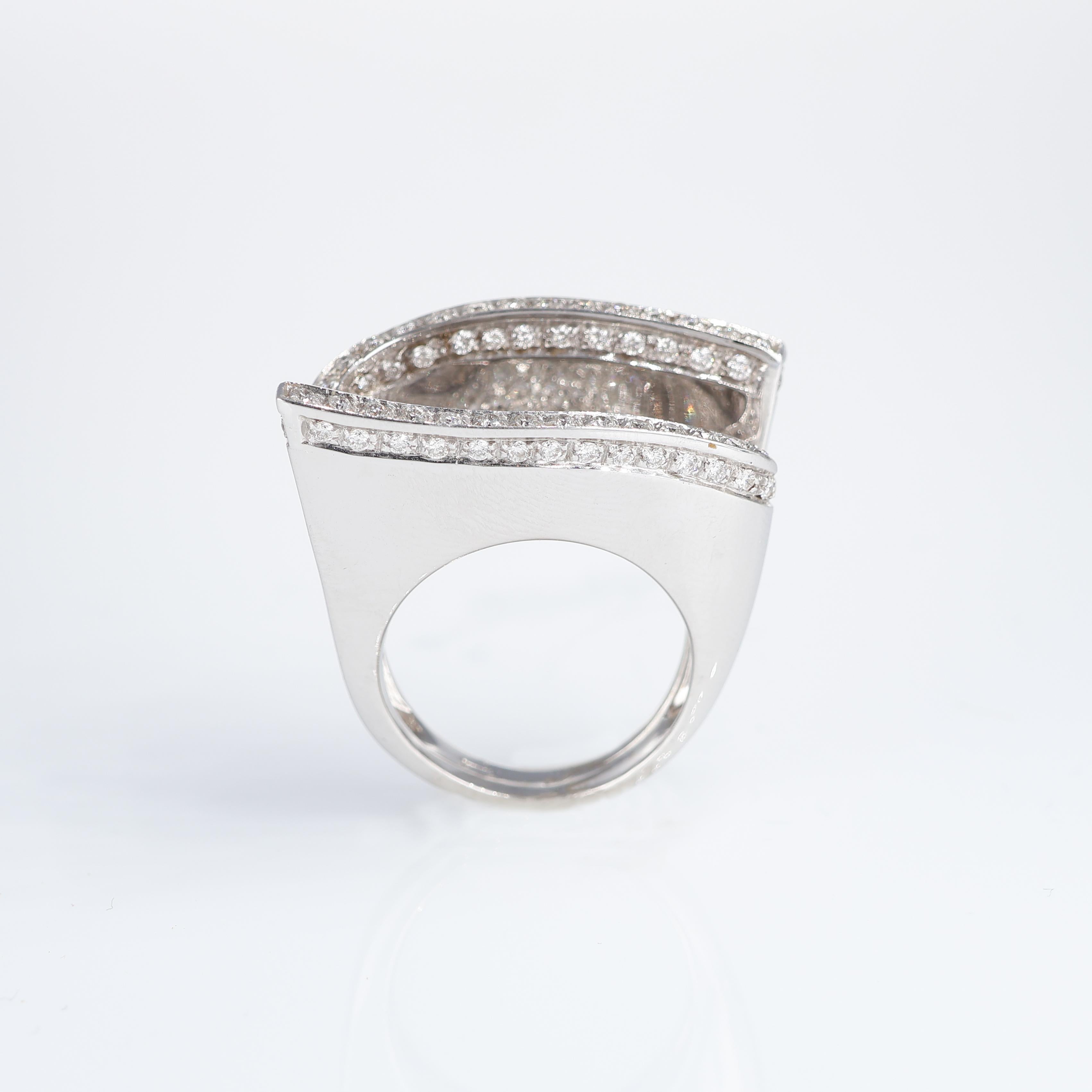 IMPORTANT NOTE:
✔ No additional costs will be added to this order.
✔ Shipping and customs duties are fully covered by us.
--------------------
This sophisticated 18kt white gold ring redefines elegance with its fluid, modern design enhanced by