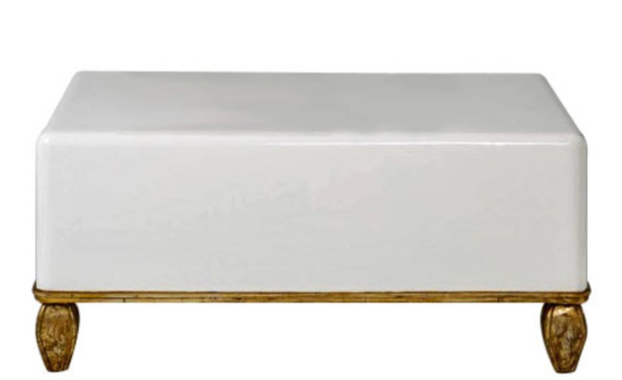 White lacquer and gilded coffee table from the Tara Shaw Maison collection with high-gloss standard finish variations available. Handcrafted in New Orleans. Standard finishes in gold leaf, white lacquer and black lacquer.

Custom dimensions and