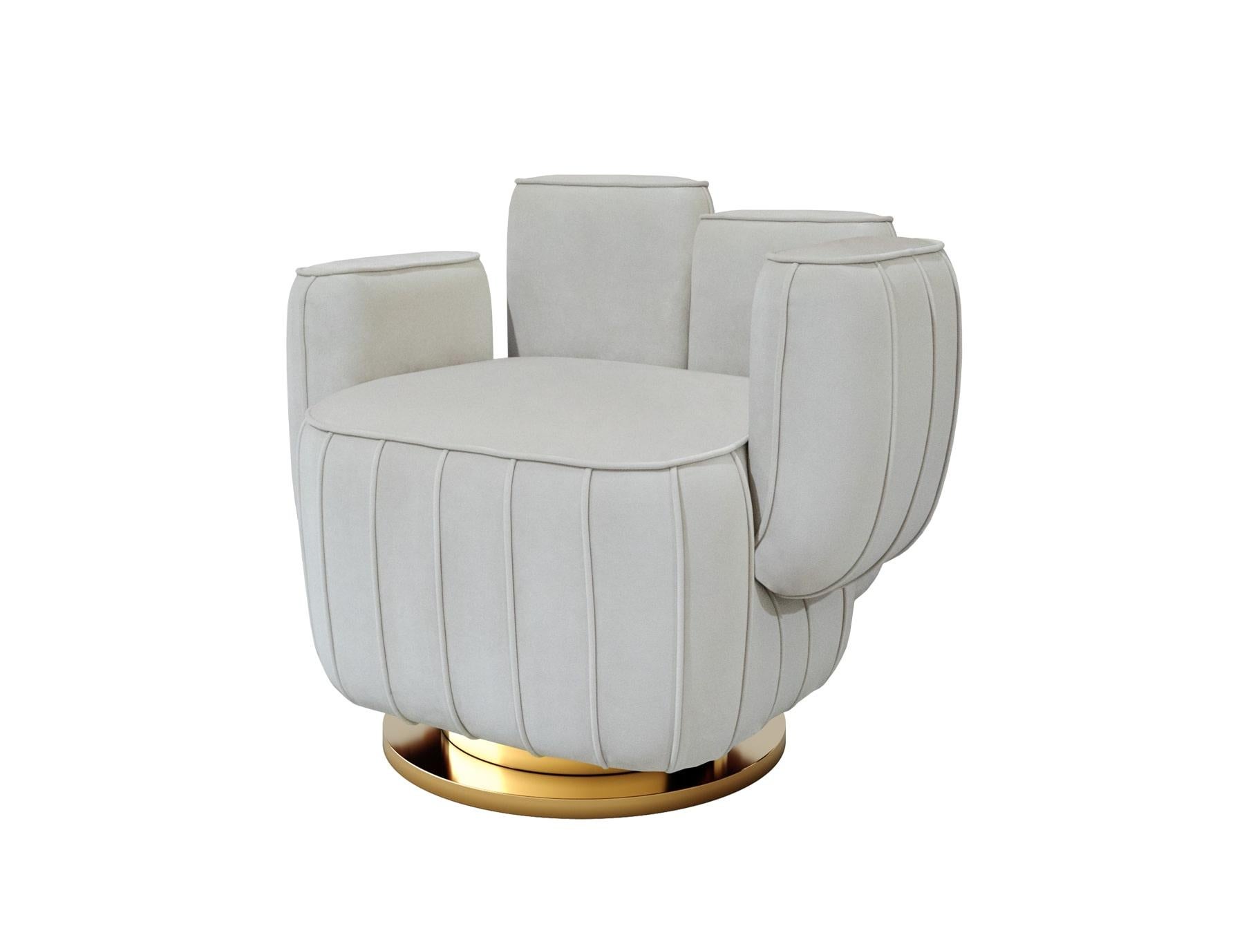 Ajui Armchair is a luxury armchair that features an artsy interpretation of a cactus and a swivel base. It is upholstered in velvet with structure and base in polished brass. This modern armchair is a conceptual piece and the perfect choice for a