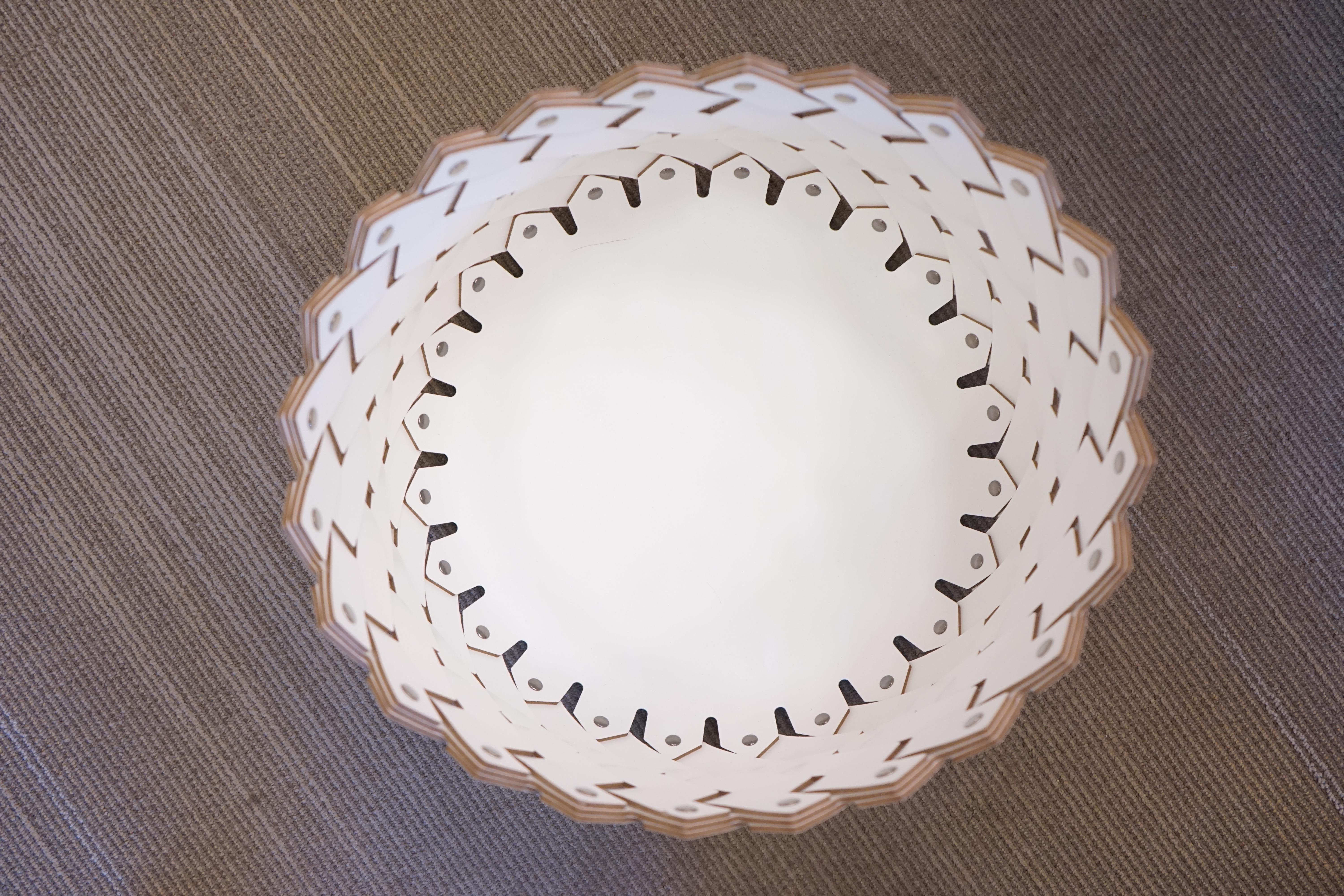 Contemporary white woven leather circular Almeria basket. Handmade in Italy.