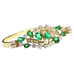Bracciale in oro contemporaneo con diamanti taglio Brilliante e smeraldo etiope