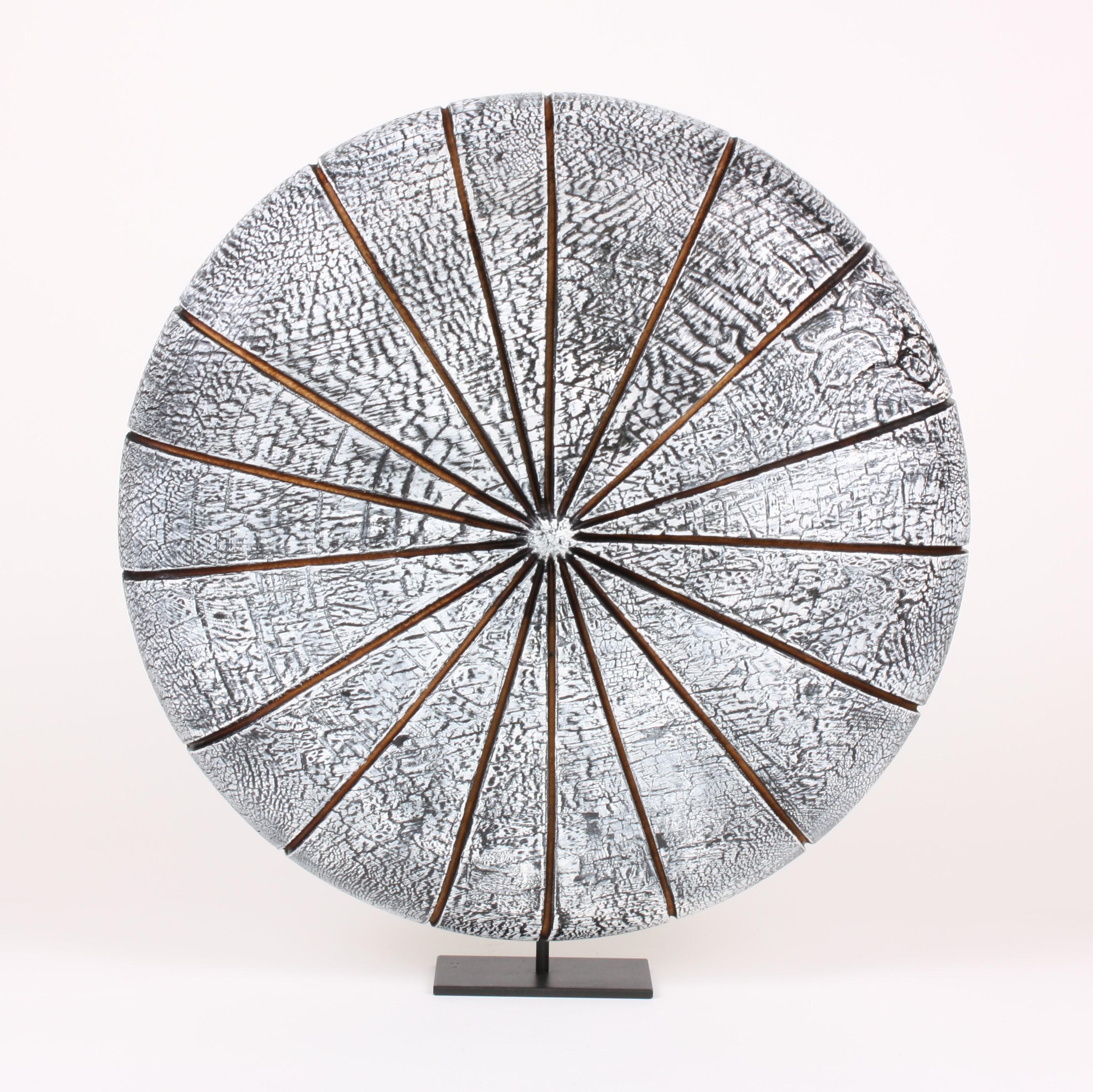 Beautifully textured contemporary white wood sculpture in the shape of a disk on a metal stand. Artist Natacha Heitz finds the primary material for her extraordinary crackled wood sculpture in the Arolla pine. After turning her wood to form