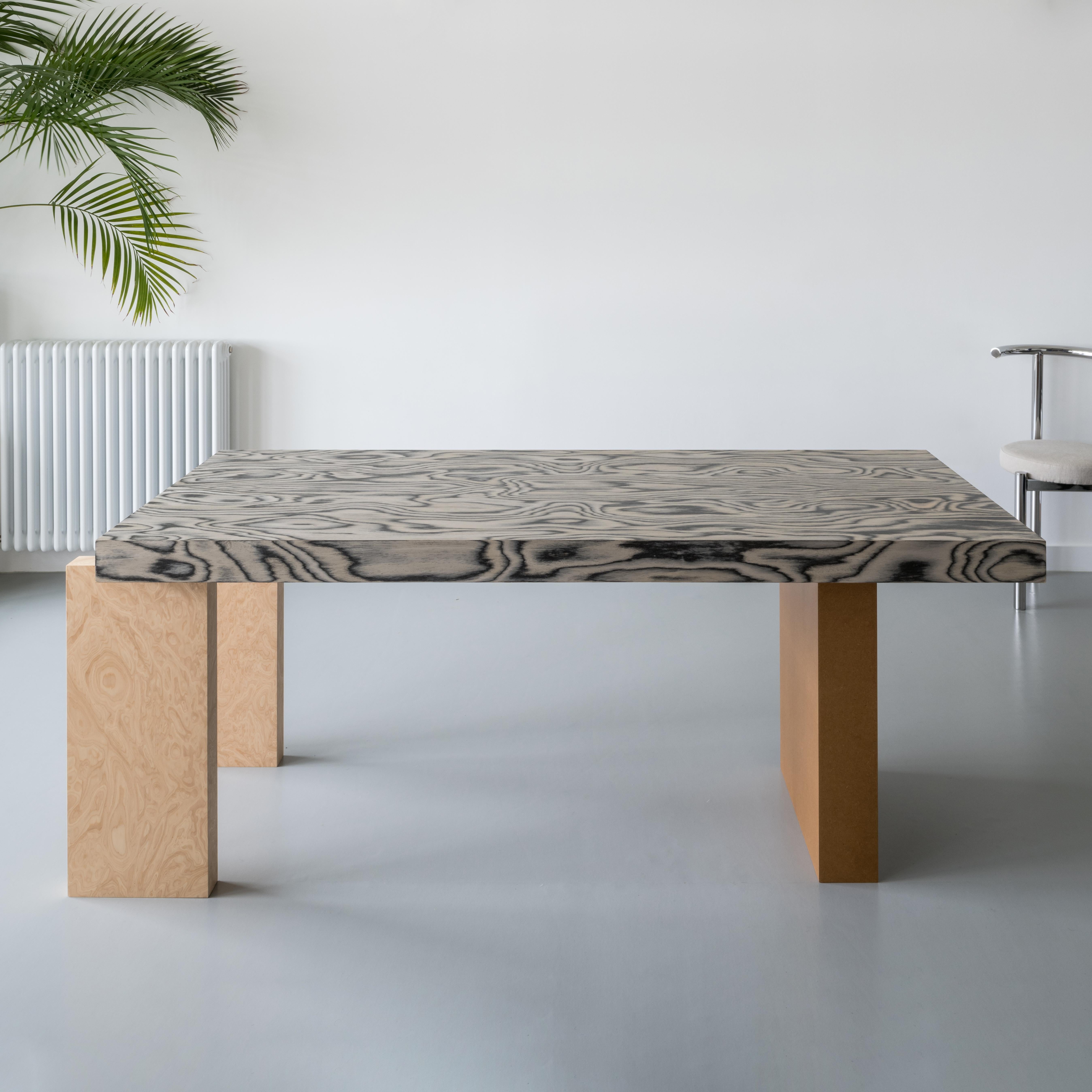 This stunning table is an original Studio James Stickley design. 

This post modern influenced but contemporary dining table is both bold and unique. A perfect statement piece for any interior. The piece also works very well as a desk.

The