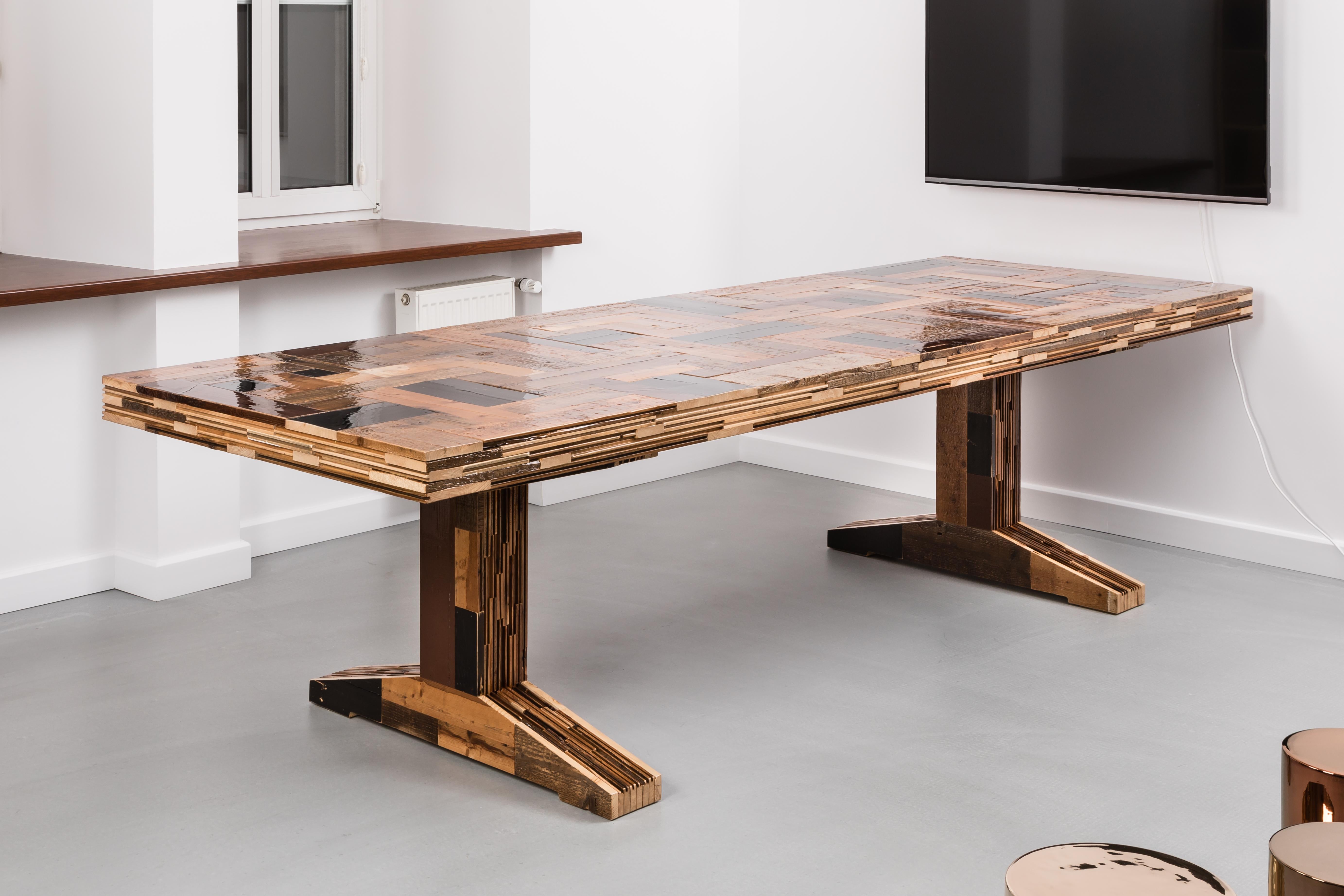 Contemporary wooden dining table, Waste table in scrapwood by Piet Hein Eek

The Waste Table in Scrapwood is meticulously crafted in Piet Hein Eek's studio using traditional woodworking technique. It brings his quintessential vocabulary of