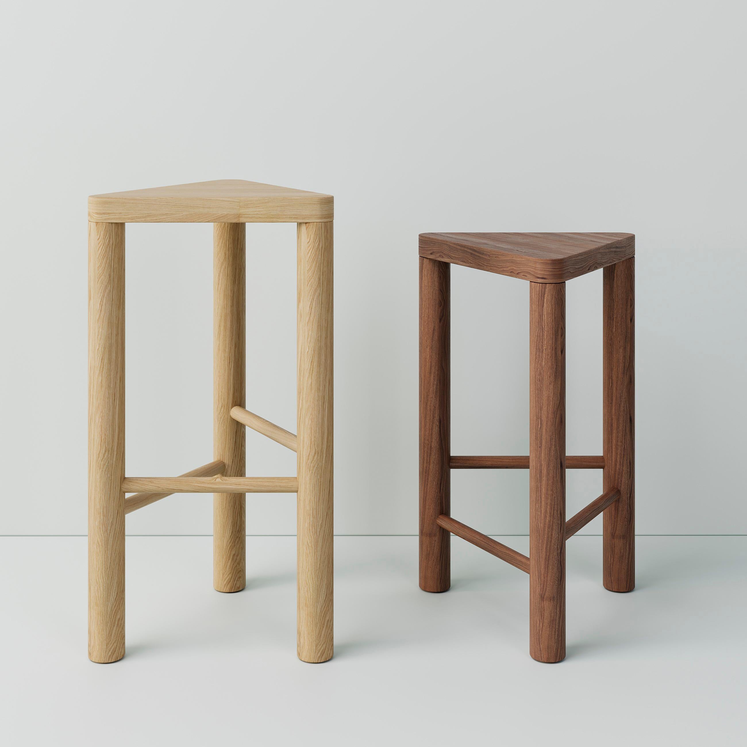 Wooden Stool 'Anyday' by Oitoproducts
Stain: Natural

Materials: Ash wood / Oak wood

Dimensions:
H 75 cm x W 41 x D 36,5 cm
H 29,5 in x W 16 in x D 14,4 in

About
Anyday is a collection of basic monolithic furniture collection. This is
