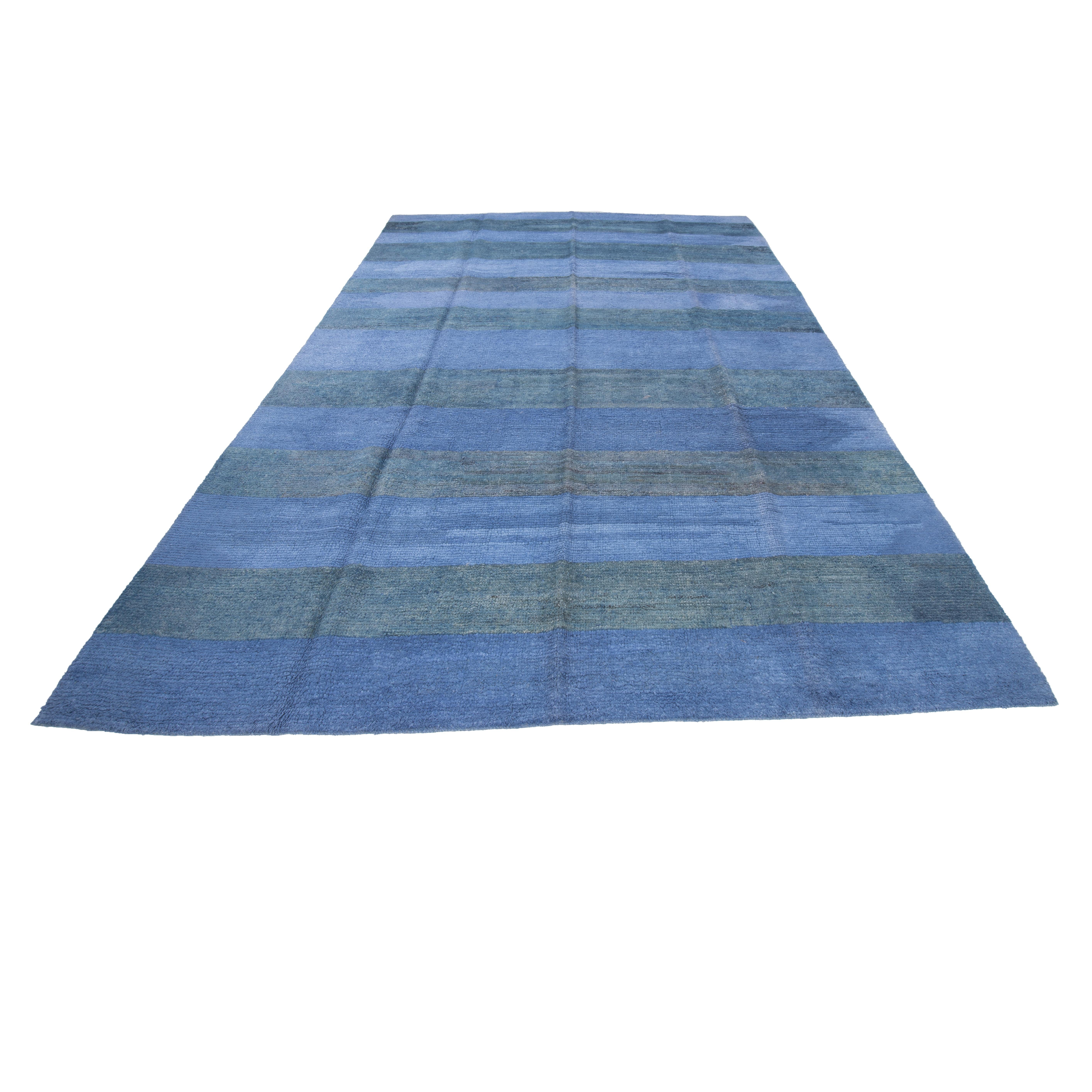 Measures: 8’7” x 11’10”
Contemporary Turkish rugs made with recycled wool are an excellent example of sustainable and eco-friendly home decor. These rugs are made using recycled wool yarn, which is obtained from various vintage, old and heavily
