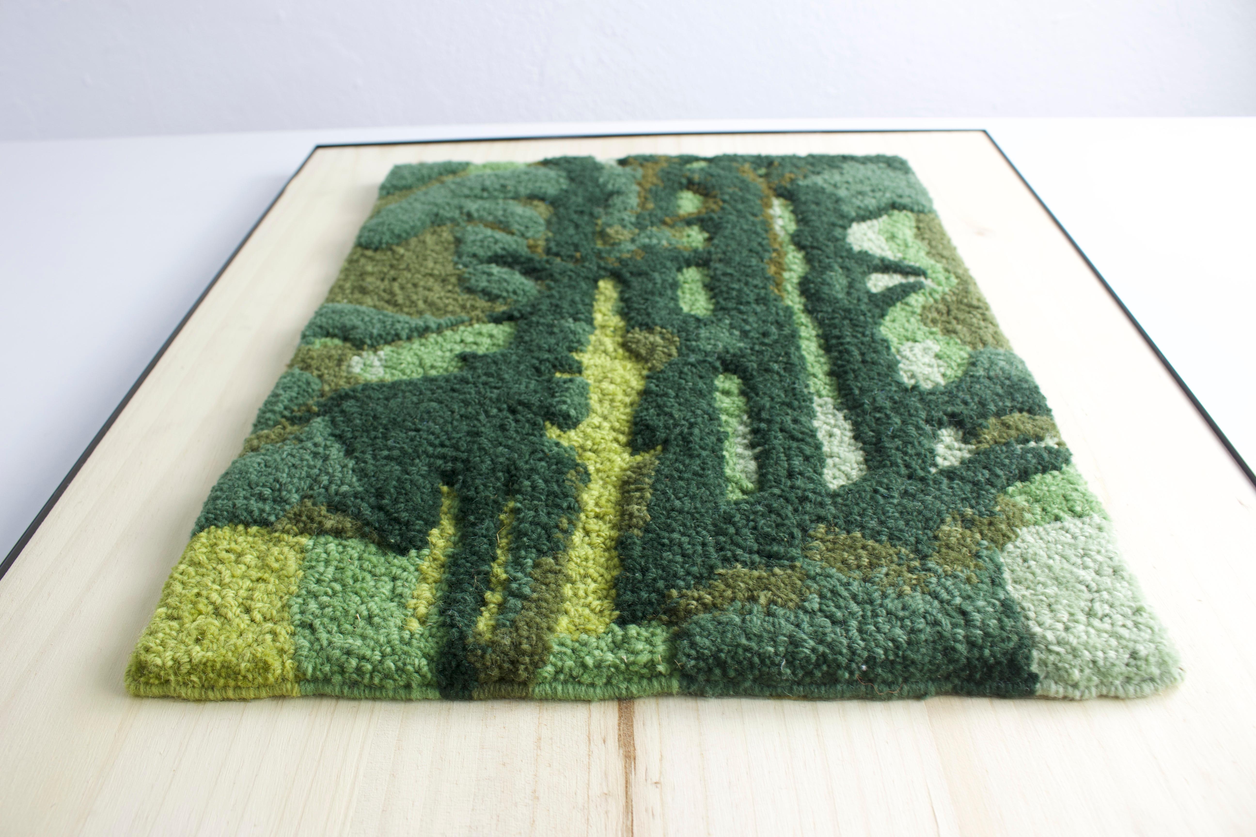 This artwork is handmade using punch needle technique and 100% Portuguese wool yarn with anti-moth treatment. The bass-relief is carved with scissors, creating different heights and a textured based landscape. The frame is made from pine wood with