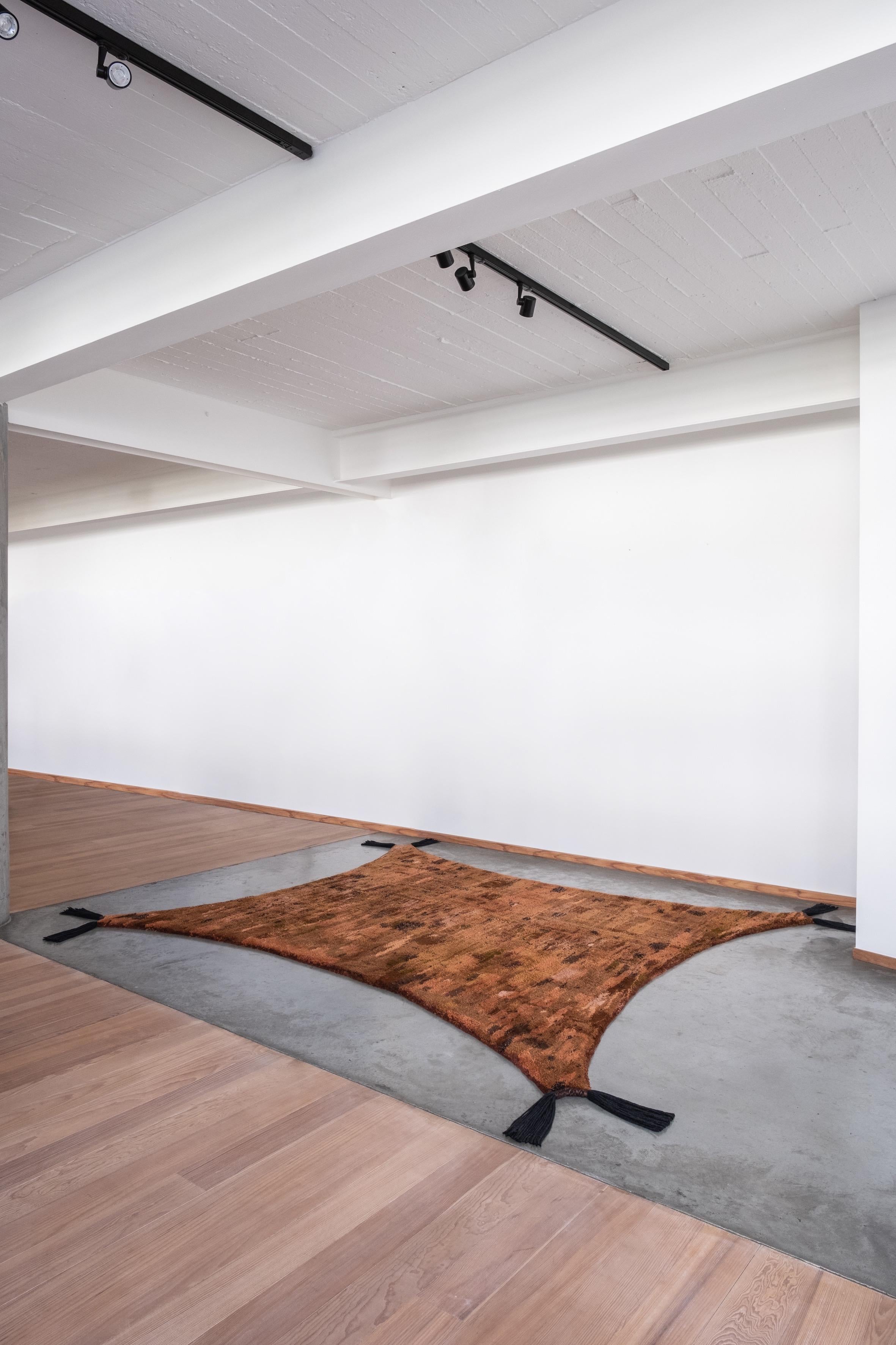 The Creatura rug stretches way beyond the classic - so curious it’s spreading out on exploration to surf further terrain. The corner of the expanding shape move radically outwards as if it’s caught in a performative momentum. Hostile to its being,