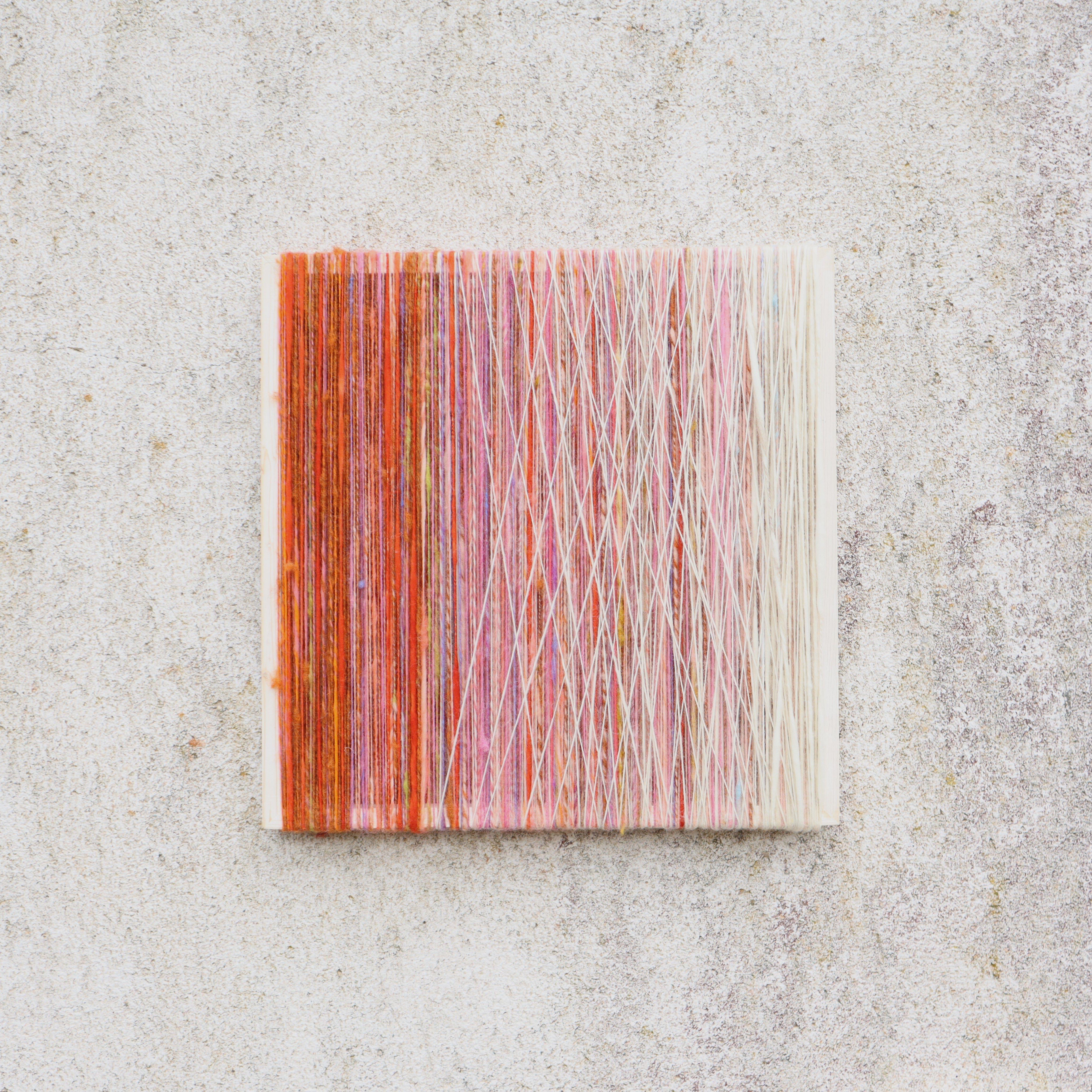 Handmade Wool Artwork made by M. Dombrowsky.
An abstract, minimalist work made of wool and wood.
Each work is handcrafted, the wool dyed and spun by hand.
Intricately wrapped, and tied around a handcrafted spruce frame. 
Wool threads form distinct