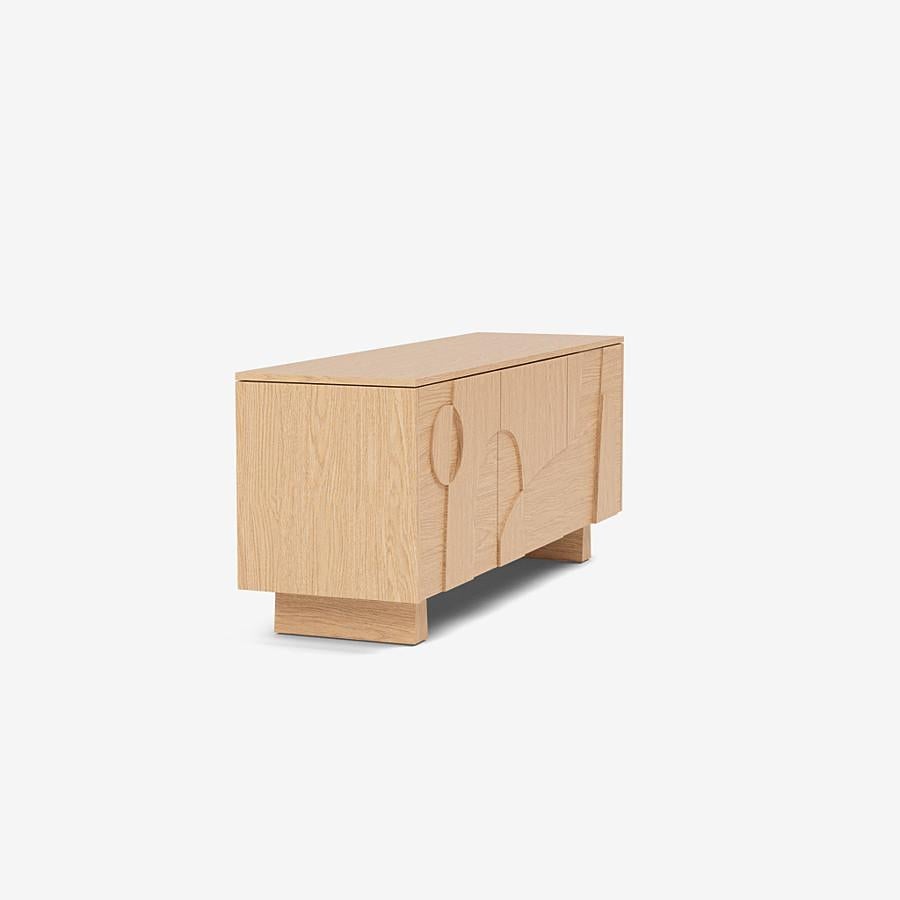 'Wynwood' Sideboard by Man of Parts
Signed by Sebastian Herkner

Dimensions: H. 68 x 49 x 161 cm
Available in various finishes: Black oak, nude oak, whiskey oak
Leg height available: Tall, Short, Wall mount

Model shown: Nude oak finish, short legs
