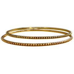 Contemporary Yellow and Rose Gold 18 Karat Gold Bangle Bracelet
