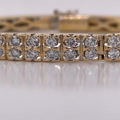 Bracelet bar contemporain en or jaune et diamants