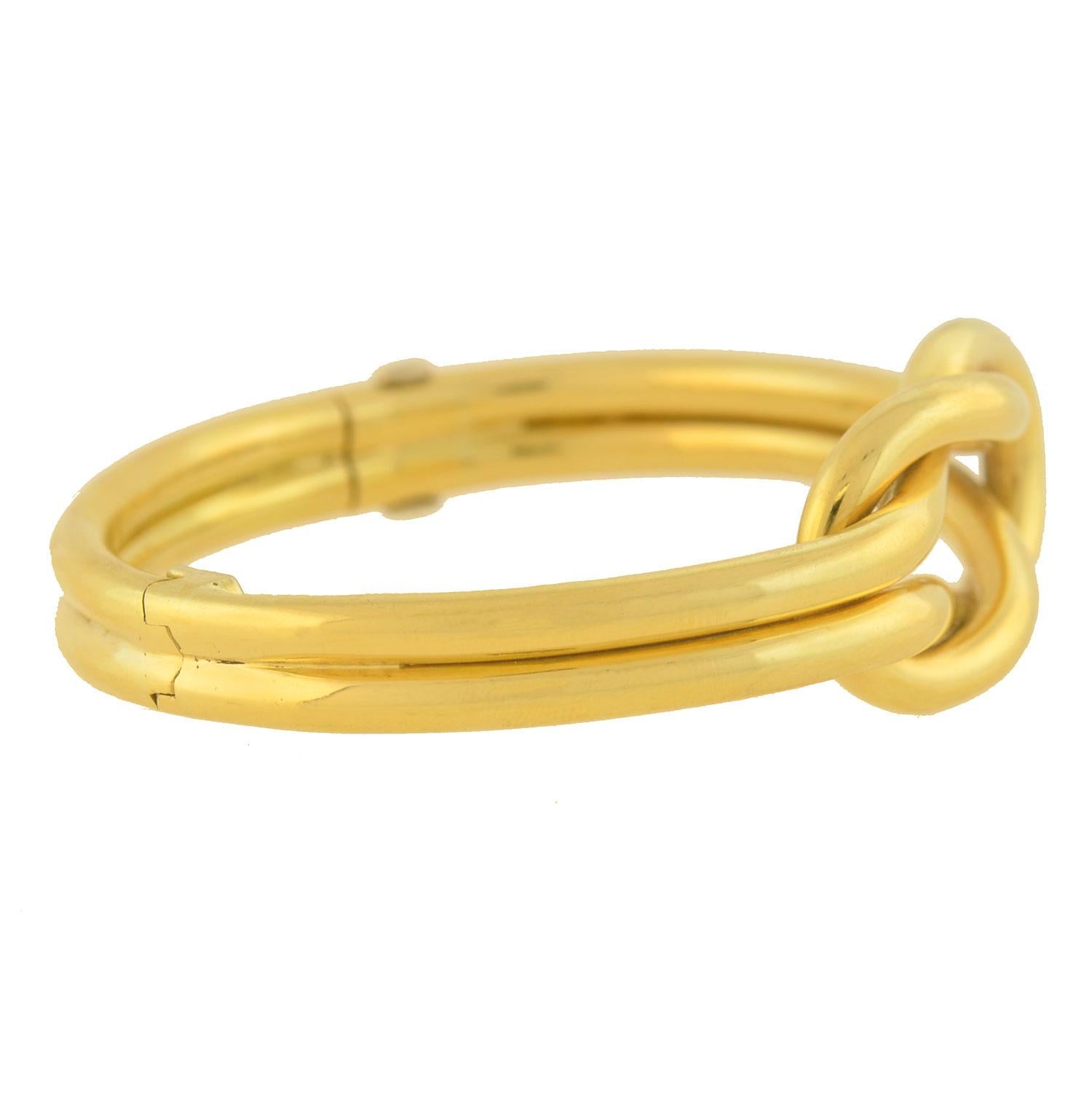 Women's Contemporary Yellow Gold Love Knot Hinged Bangle Bracelet
