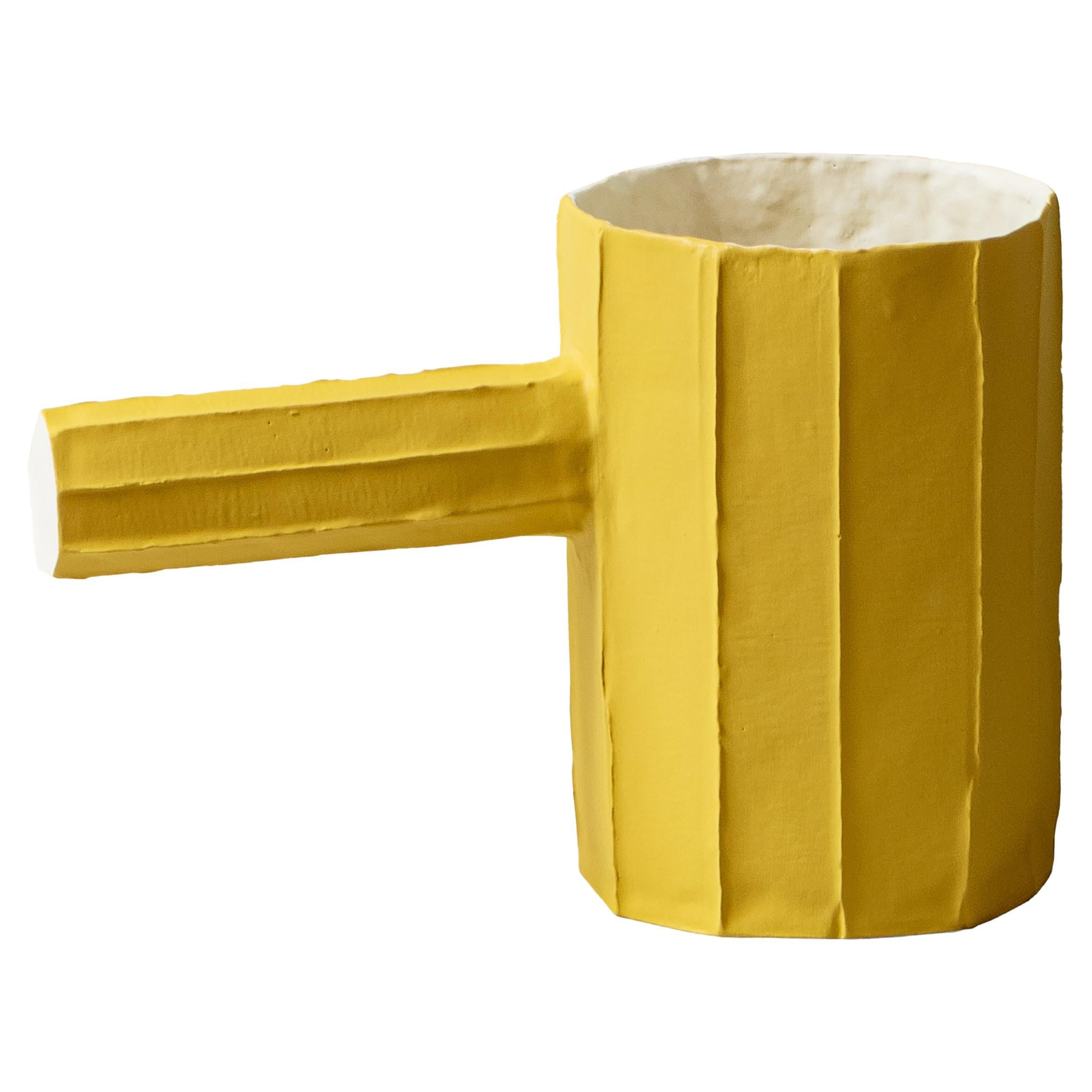 Scultura contemporanea in carta argilla gialla PINO MONO