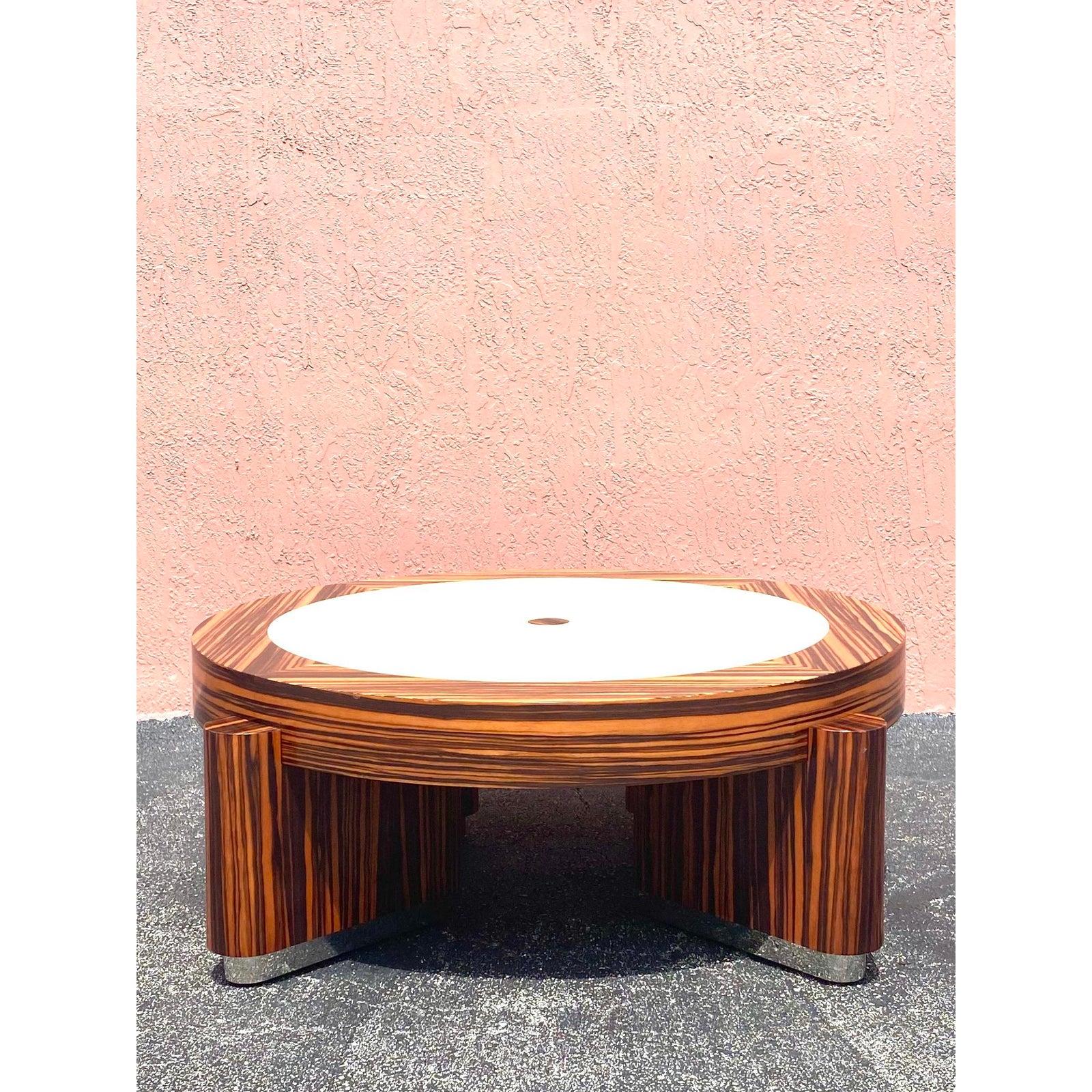 Incredible Contemporary zebra wood and Shagreen coffee table. Round space with thick legs that rest on a chrome plinth. Custom made.