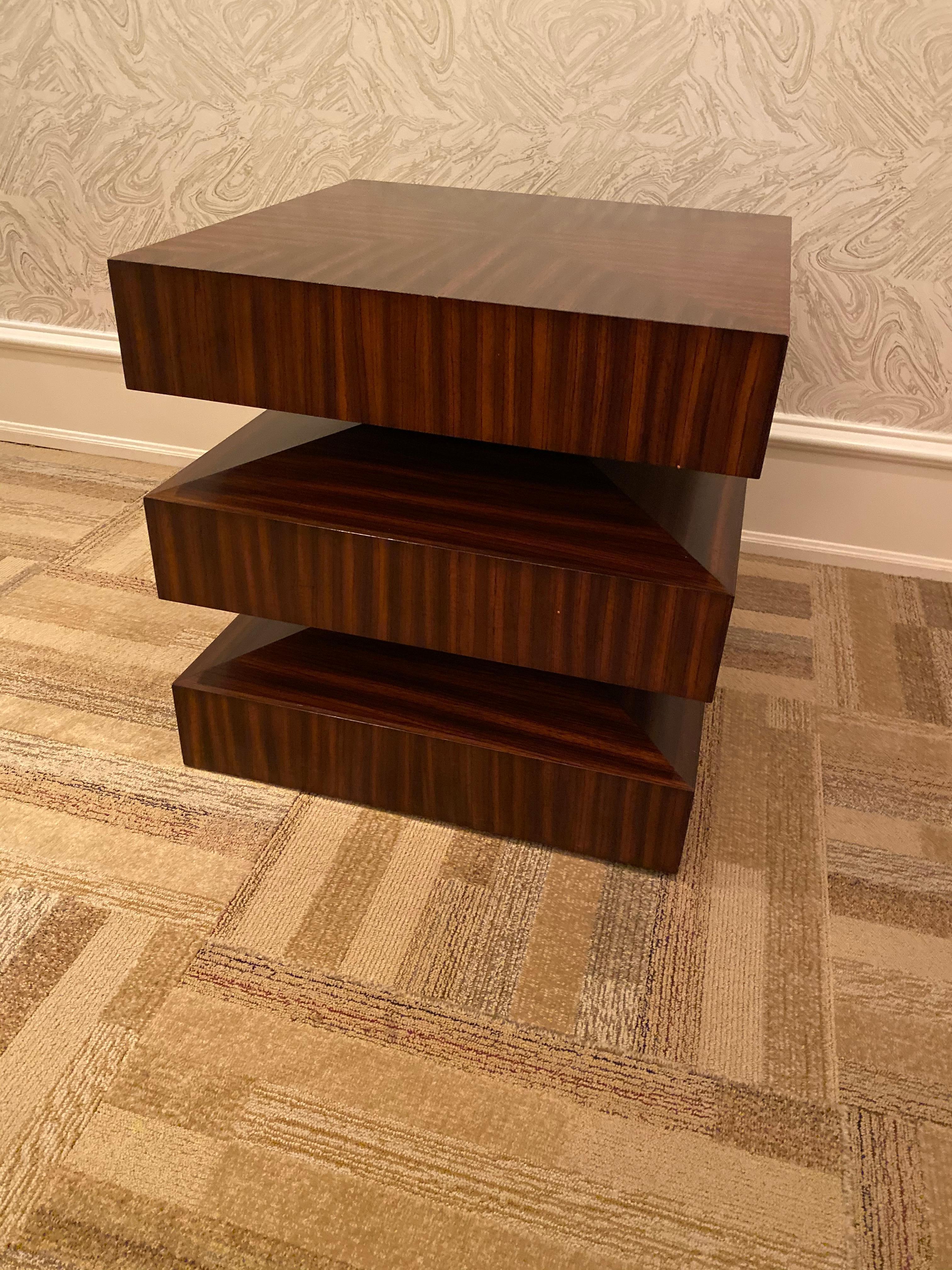 Crafted with quality zebra wood veneer and accented with a warm brown fine finish rubbed by hand,
Fabulous and unique! This side or end table is such a statement piece!
 