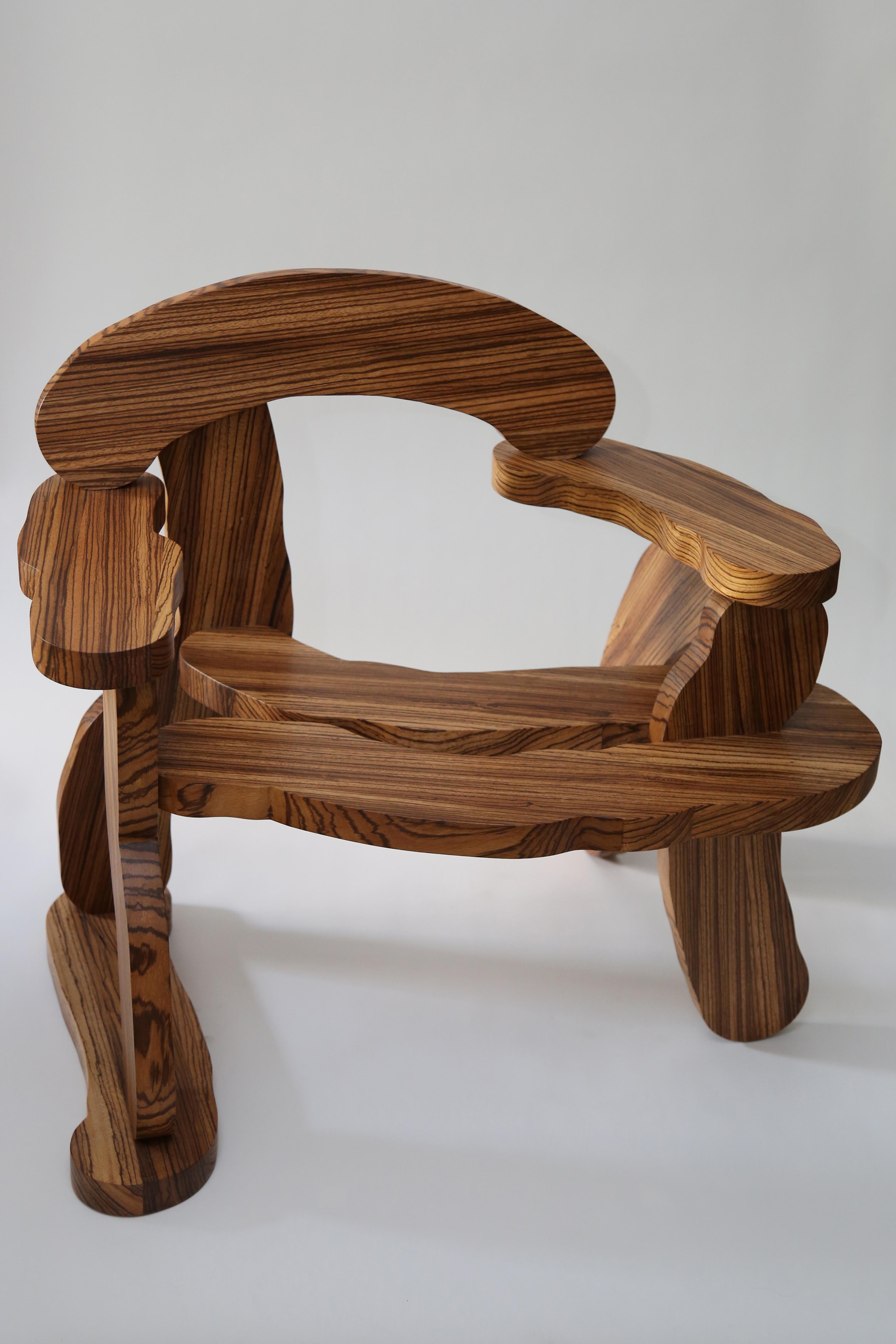 Unique handmade solid Zebrano wood armchair from the 