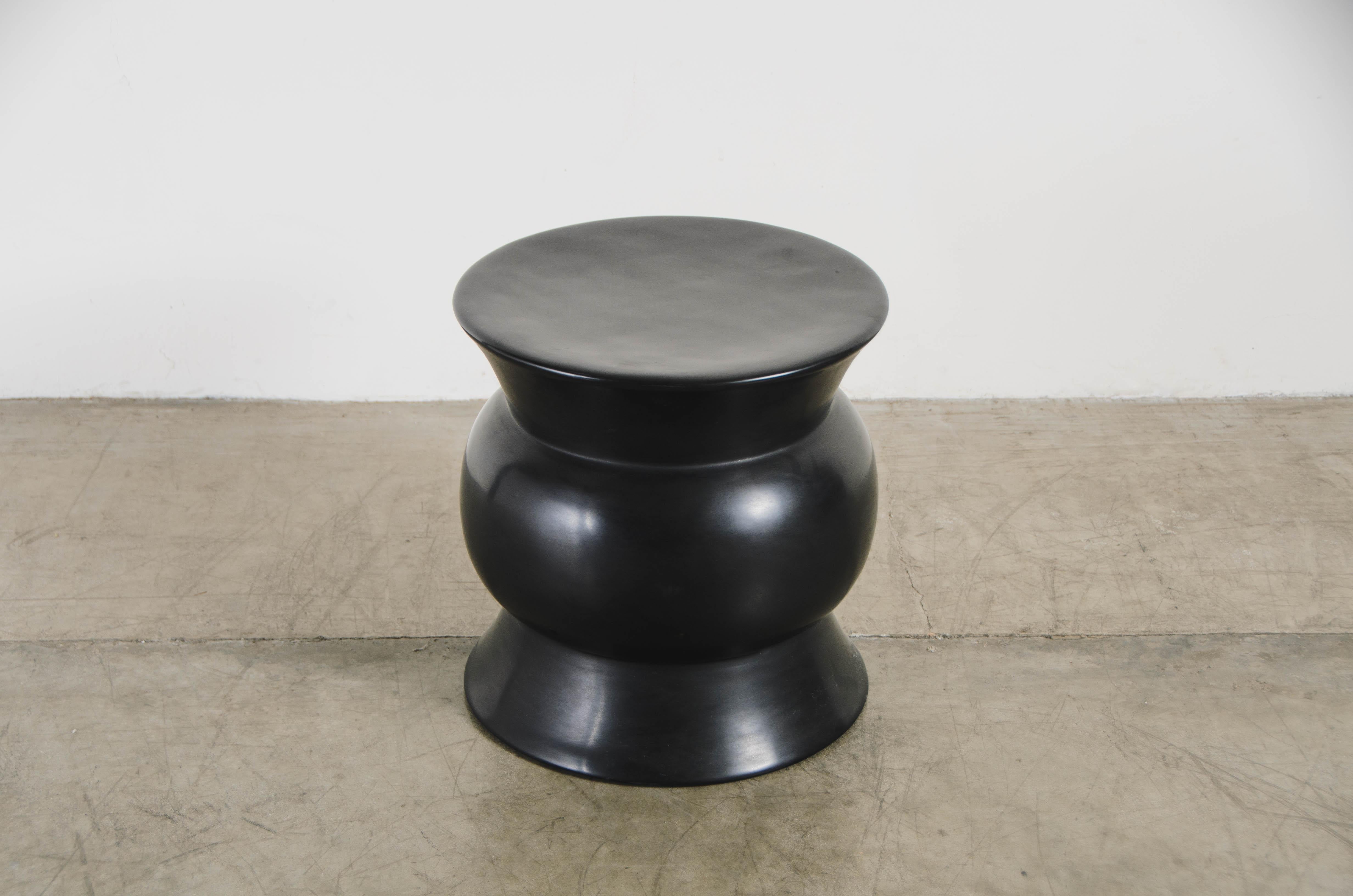 Zun drumstool 
Black lacquer 
Hand repoussé
Limited edition
Each piece is individually crafted and is unique. 
Lacquer is a technique that dates back to the Shang dynasty, circa 1600-1100 B.C. These pieces are made with at least 60 coats of