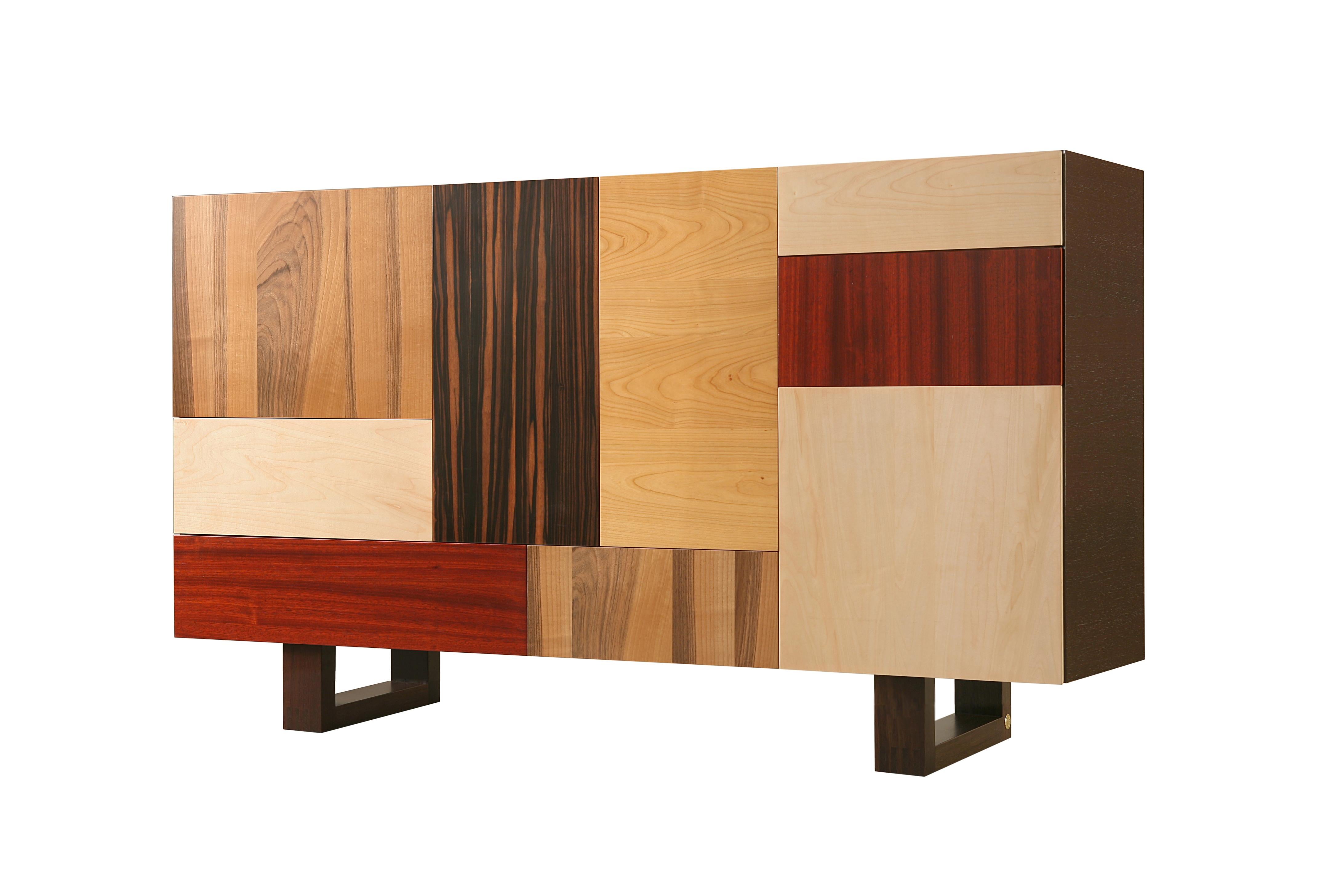 Fantesca is a contemporary sideboard made of ashwood with 2 drawers and 4 doors.
The front doors are made of cherry, walnut, ebony, padouk, and maple wood.
The ash frame can be customized with different wood finishes
Made in italy by Morelato

 
