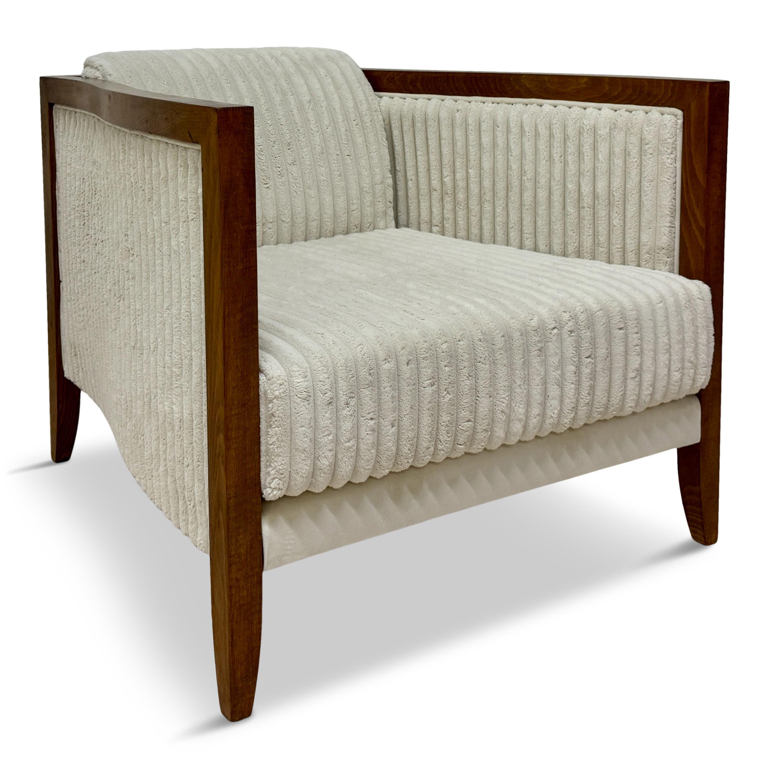 Armchair

Ribbed upholstery

This one is in stock in Italy but can be made to order

Several options for fabric

Seat height 38cm

Contemporary Italy

Enhance your living space with the luxurious comfort and refined elegance of this contemporary