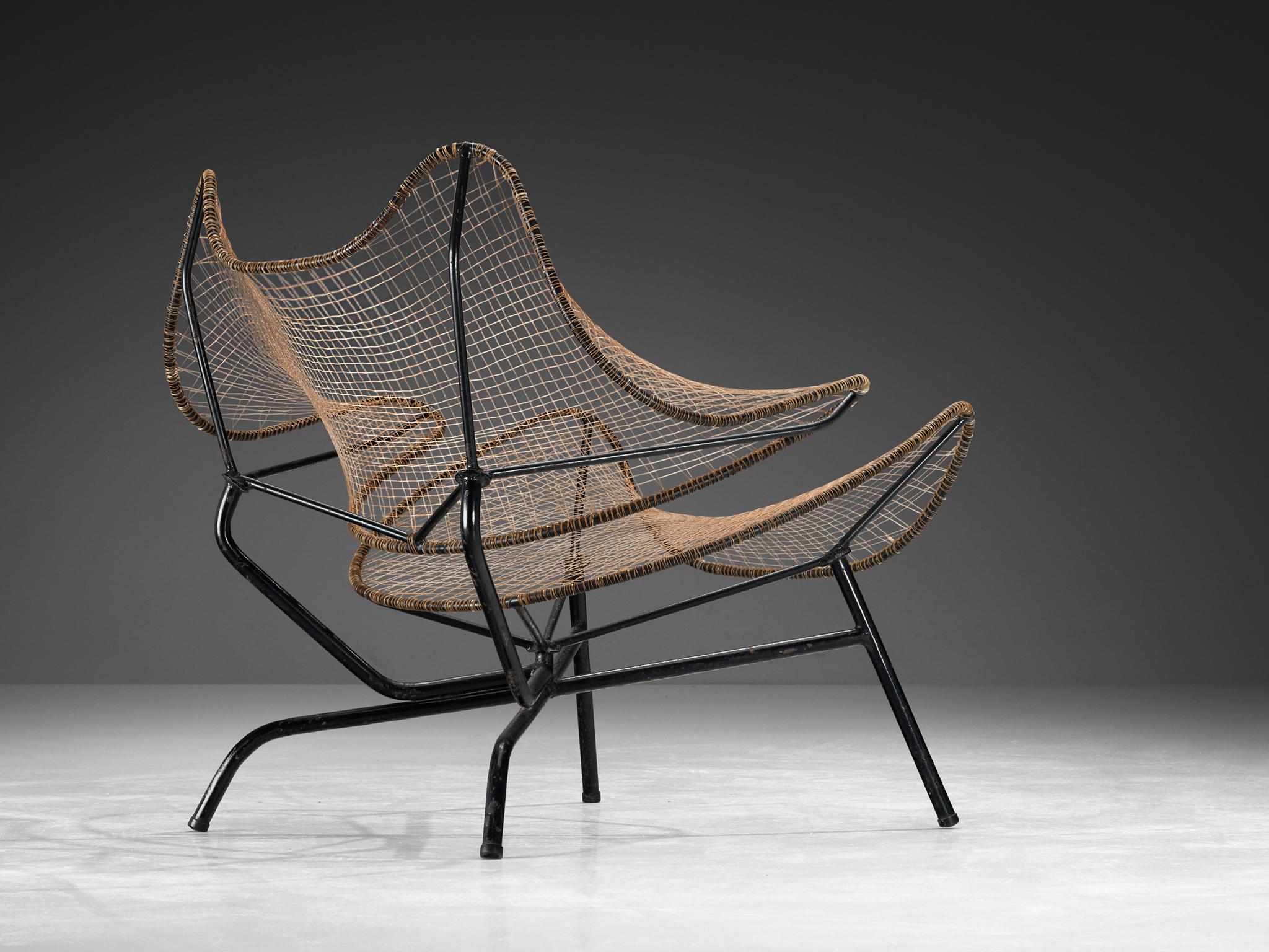 Sergio Conti, Marisa Forlani and Luciano Grassi for Emilio Paoli, 'Artigianato' lounge chair from the Monofilo series, lacquered iron, nylon, Italy, design 1953, made 1954/55

During the Mostra dell’Artigianato exhibition in Florence in 1954,