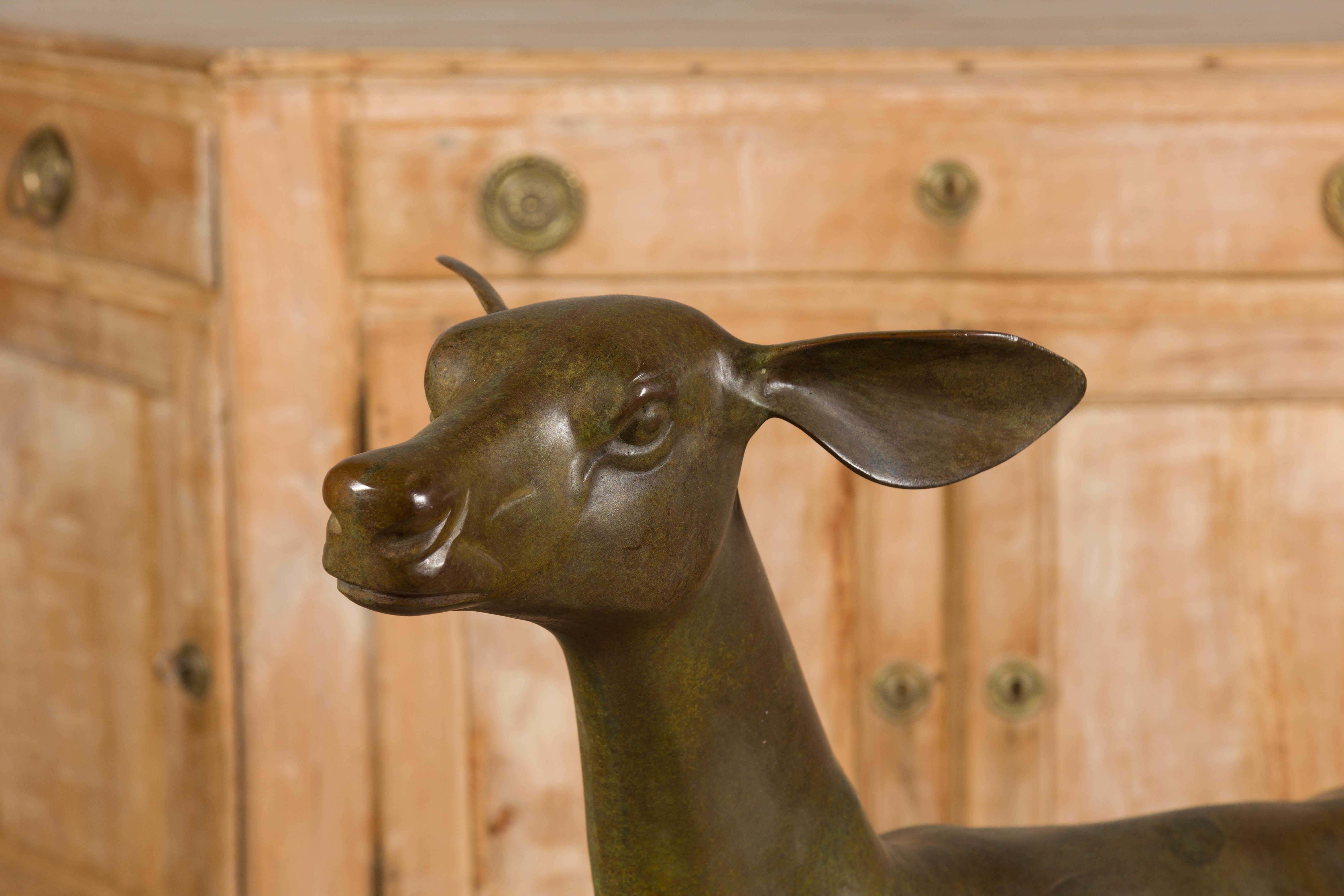 20th Century Continental 1930s Life Size Bronze Sculpture of a Deer Standing on its Four Legs For Sale