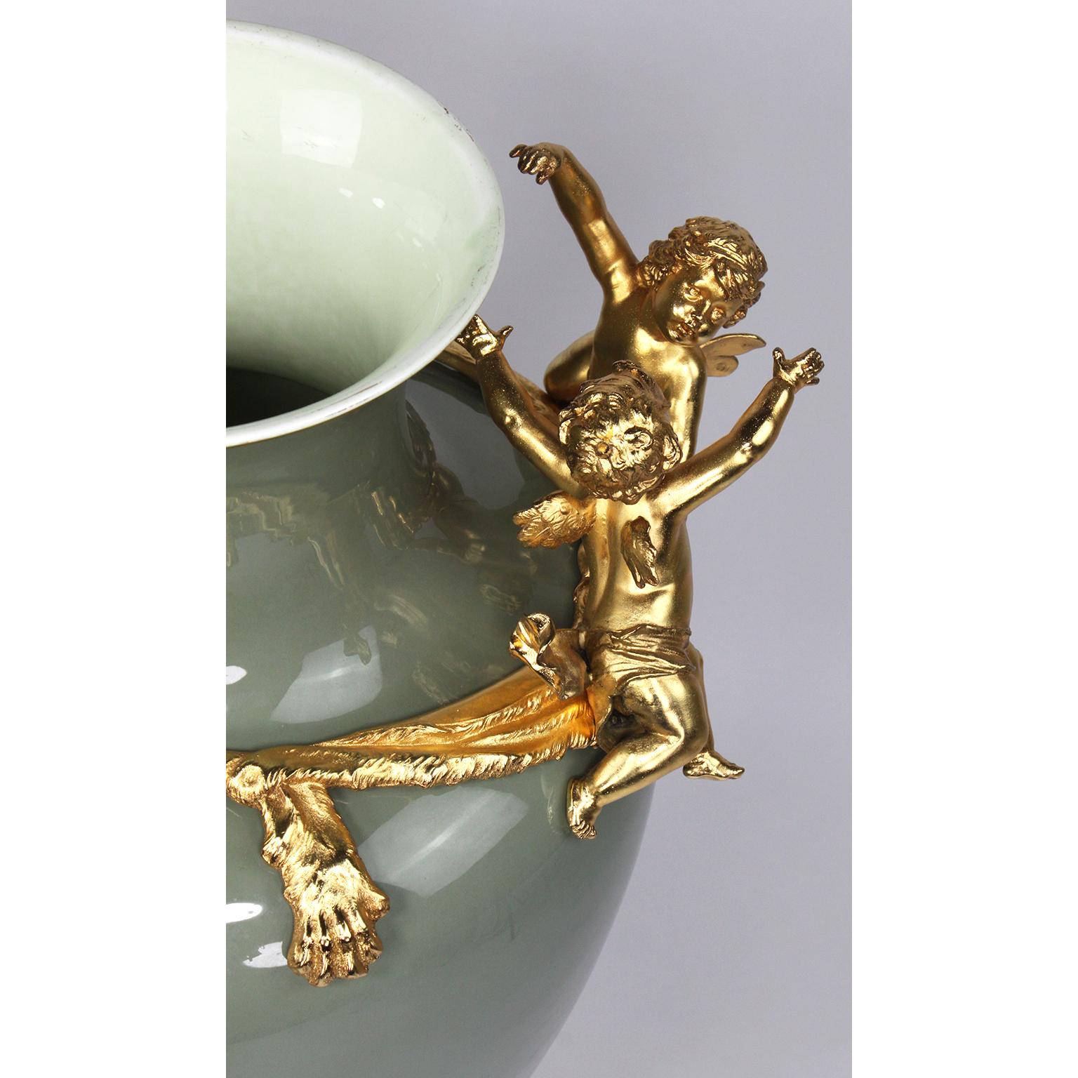 Continental 19th-20th Century Porcelain and Gilt Metal Mounted Vase with Cherubs 1
