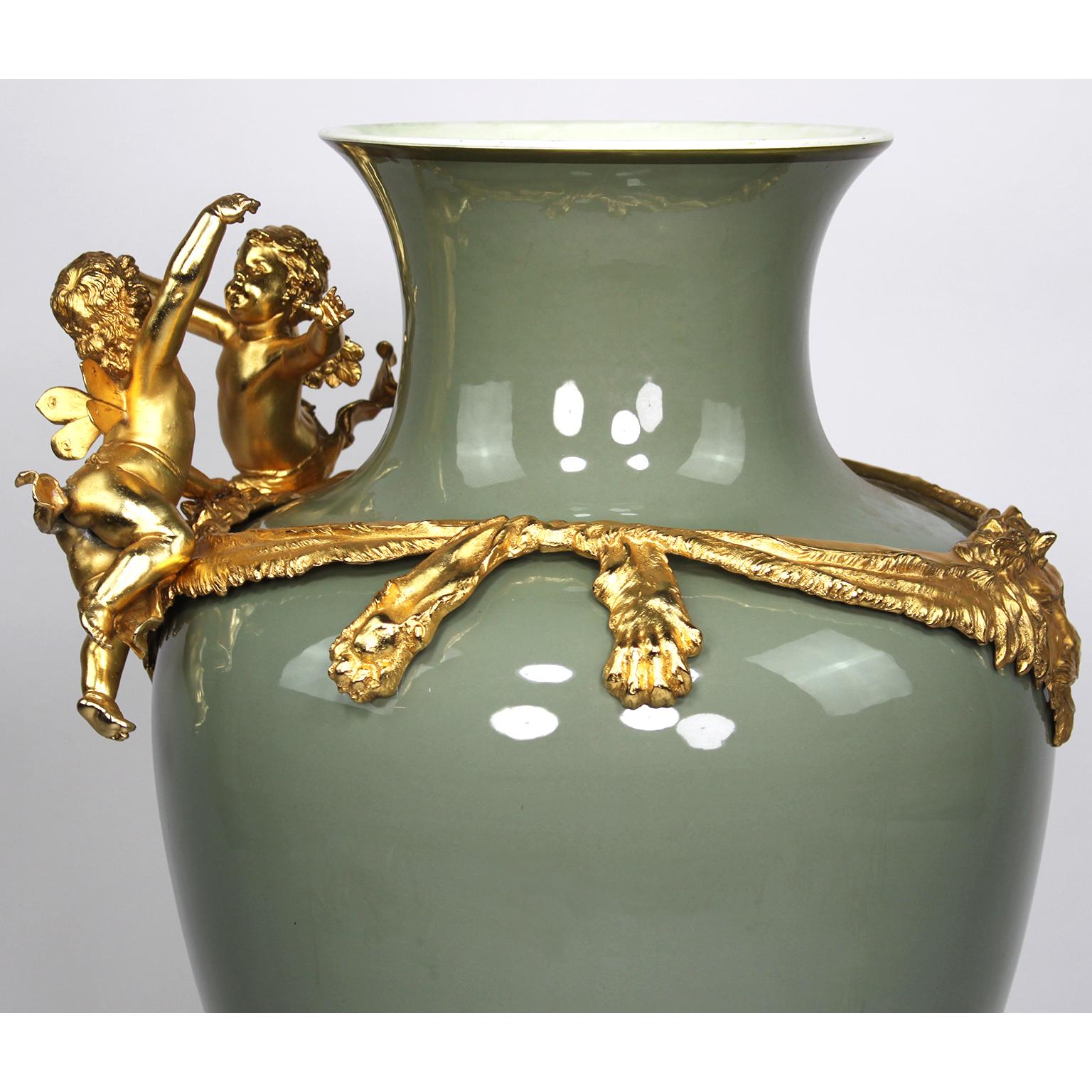 Continental 19th-20th Century Porcelain and Gilt Metal Mounted Vase with Cherubs 2