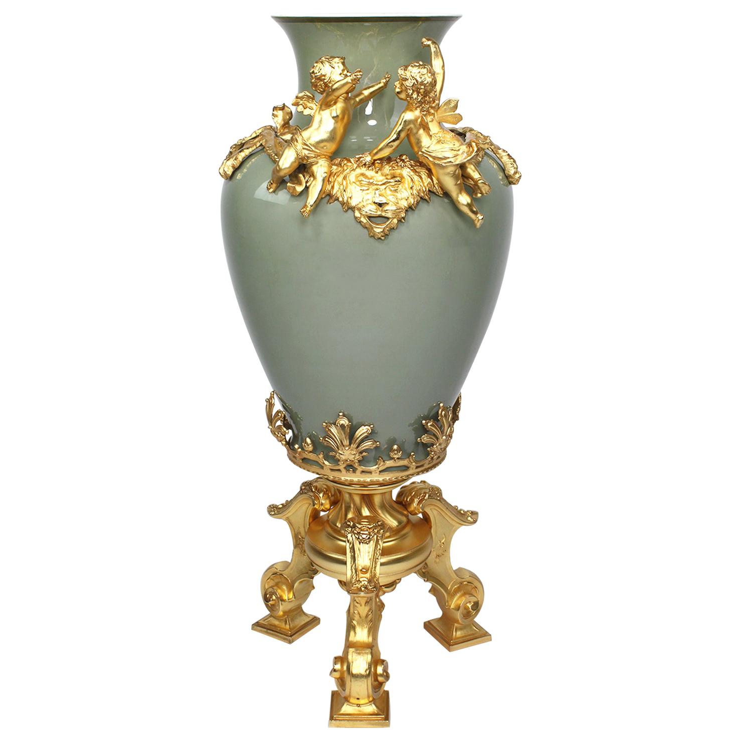 Continental 19th-20th Century Porcelain and Gilt Metal Mounted Vase with Cherubs