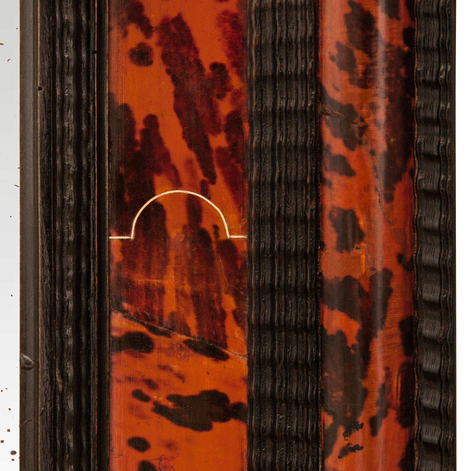 19th Century Continental 19th century Baroque st. Tortoiseshell and Ebonized Fruitwood mirror For Sale