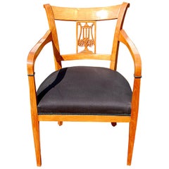 Continental 19th Century Biedermeier Cherry Armchair with Carved Lyre Back