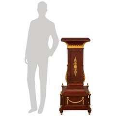 Continental 19th century Empire st. Mahogany and Giltwood pedestal