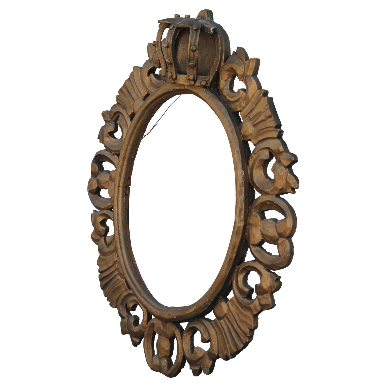 Beautiful gold continental oval frame from the 19th century. It is covered in carved detailing with acanthus leaves and a large crown at the top.
It could easily be used as a picture frame or mirror frame.

Frame dimensions:
Outside H 32