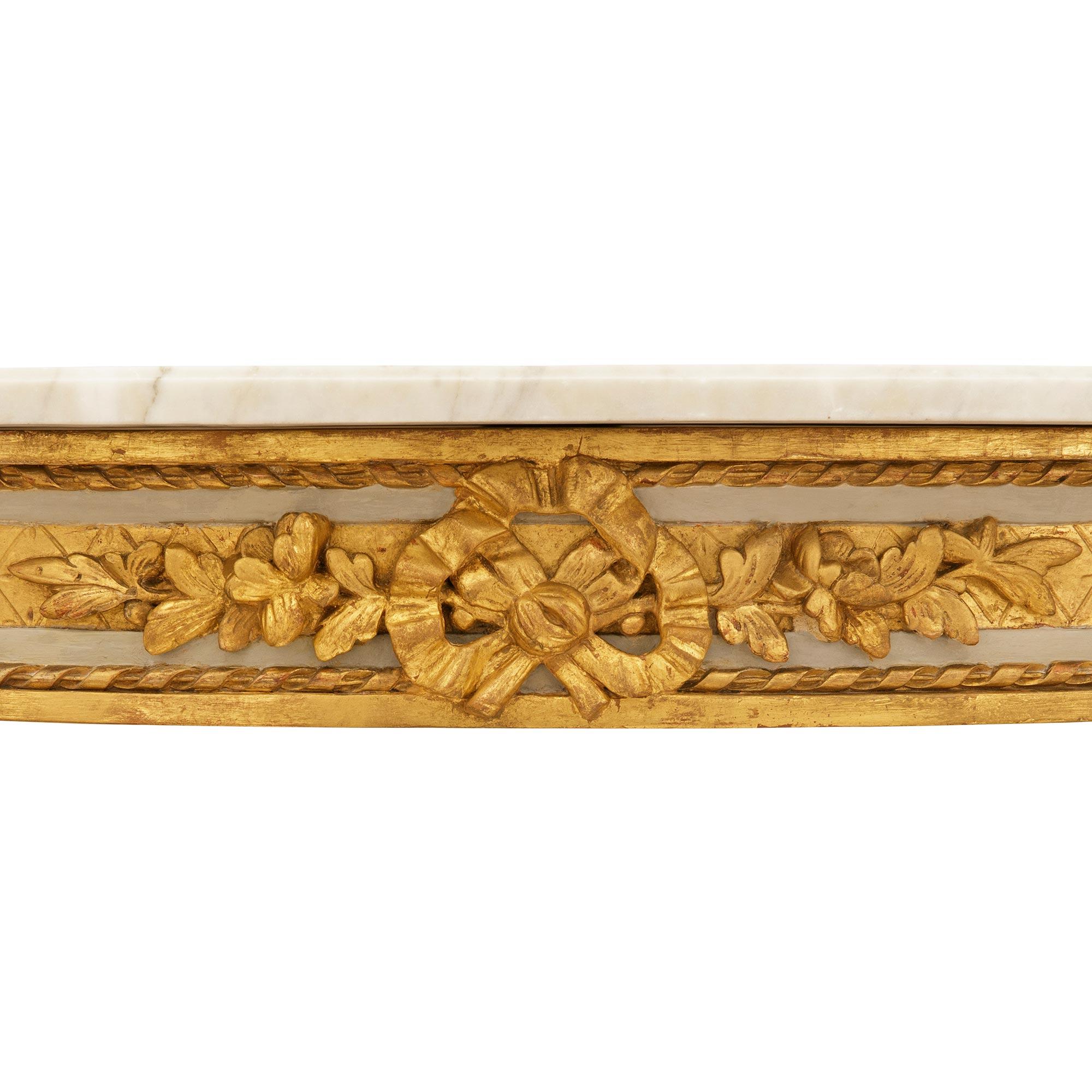 Consola continental del siglo XIX de estilo Luis XVI de madera, giltwood y mármol en venta 1