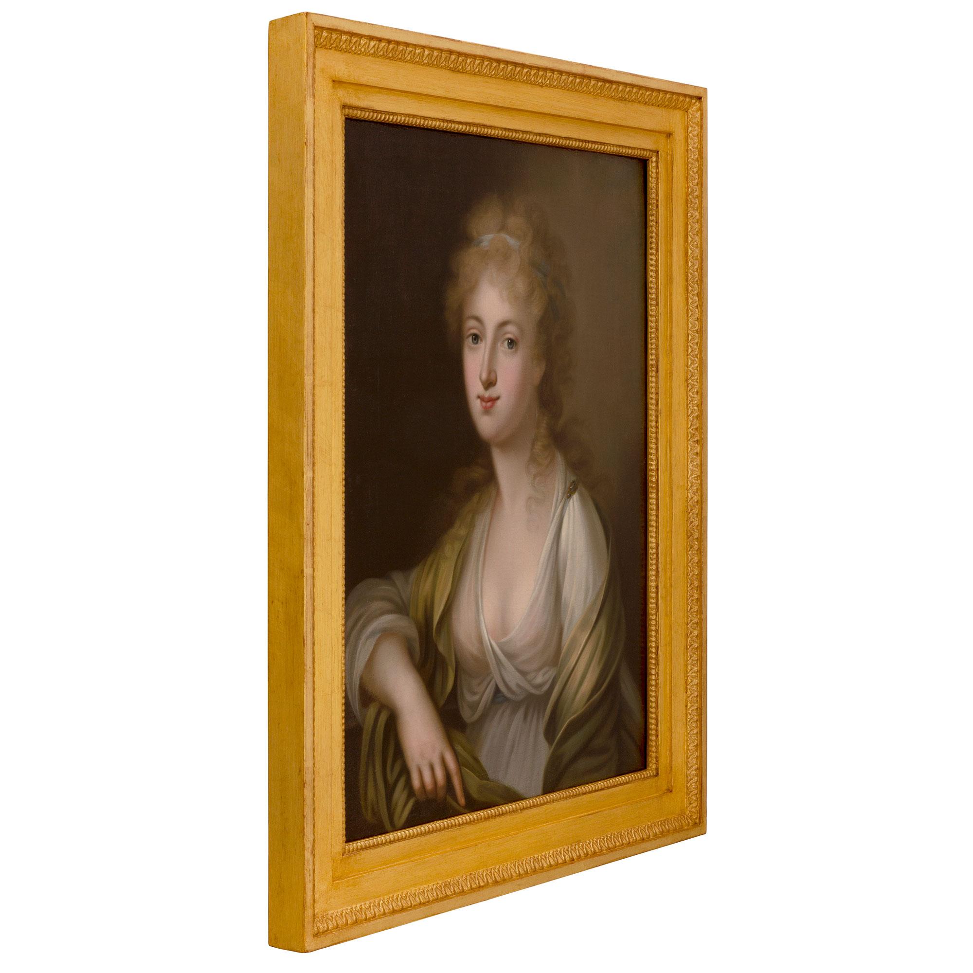 A charming Continental 19th century oil on canvas painting of a young maiden. The wonderfully executed painting is set within a charming giltwood frame with a fine mottled design and an elegant foliate and beaded band. At the center is a beautiful
