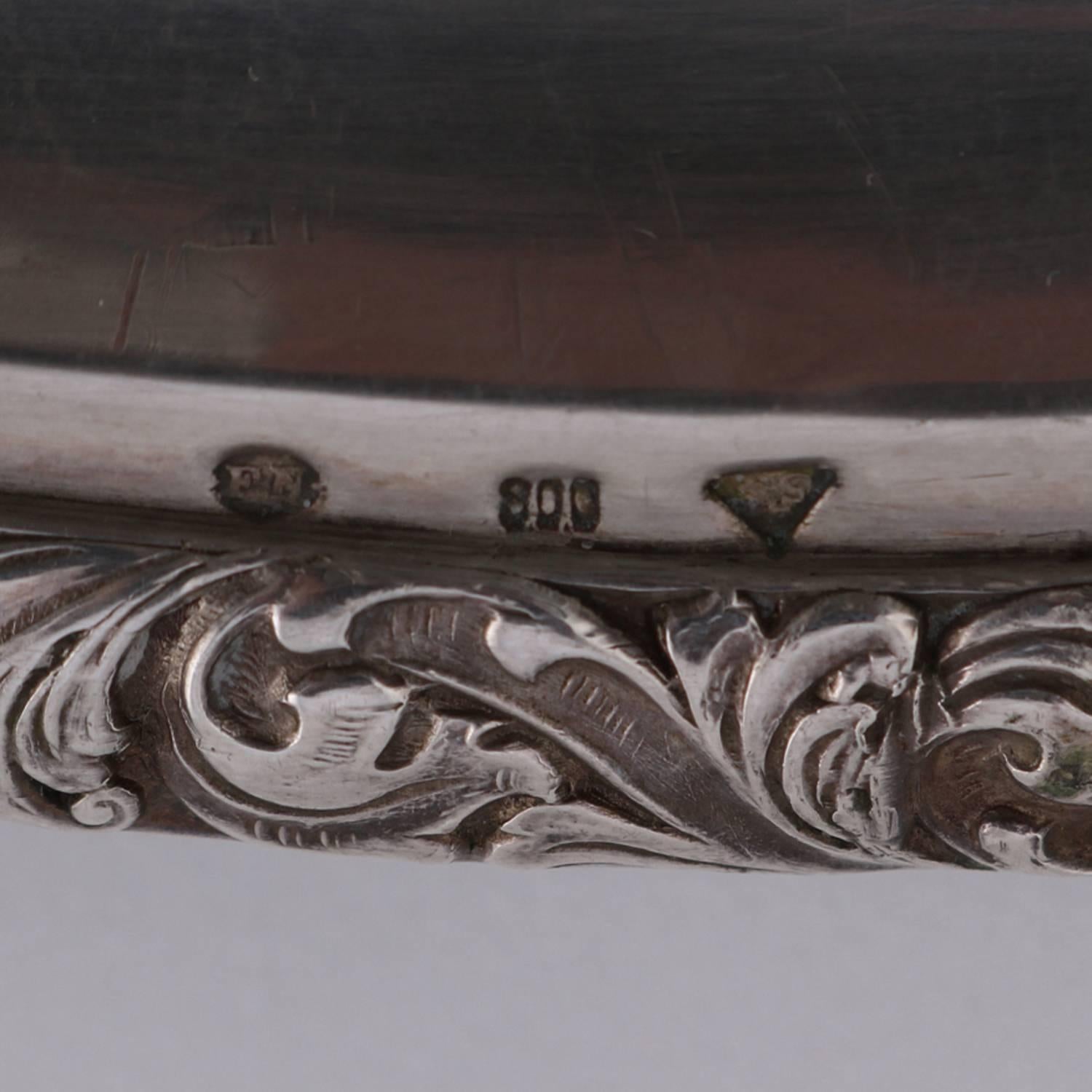 Continental .800 silver tray possibly Bohemia and Moravia features clipped corner rectangular form with a flat-bottomed oval well and foliate rim, rim touch marks include .800 and triangle reminiscent of number five in triangle (silver fineness