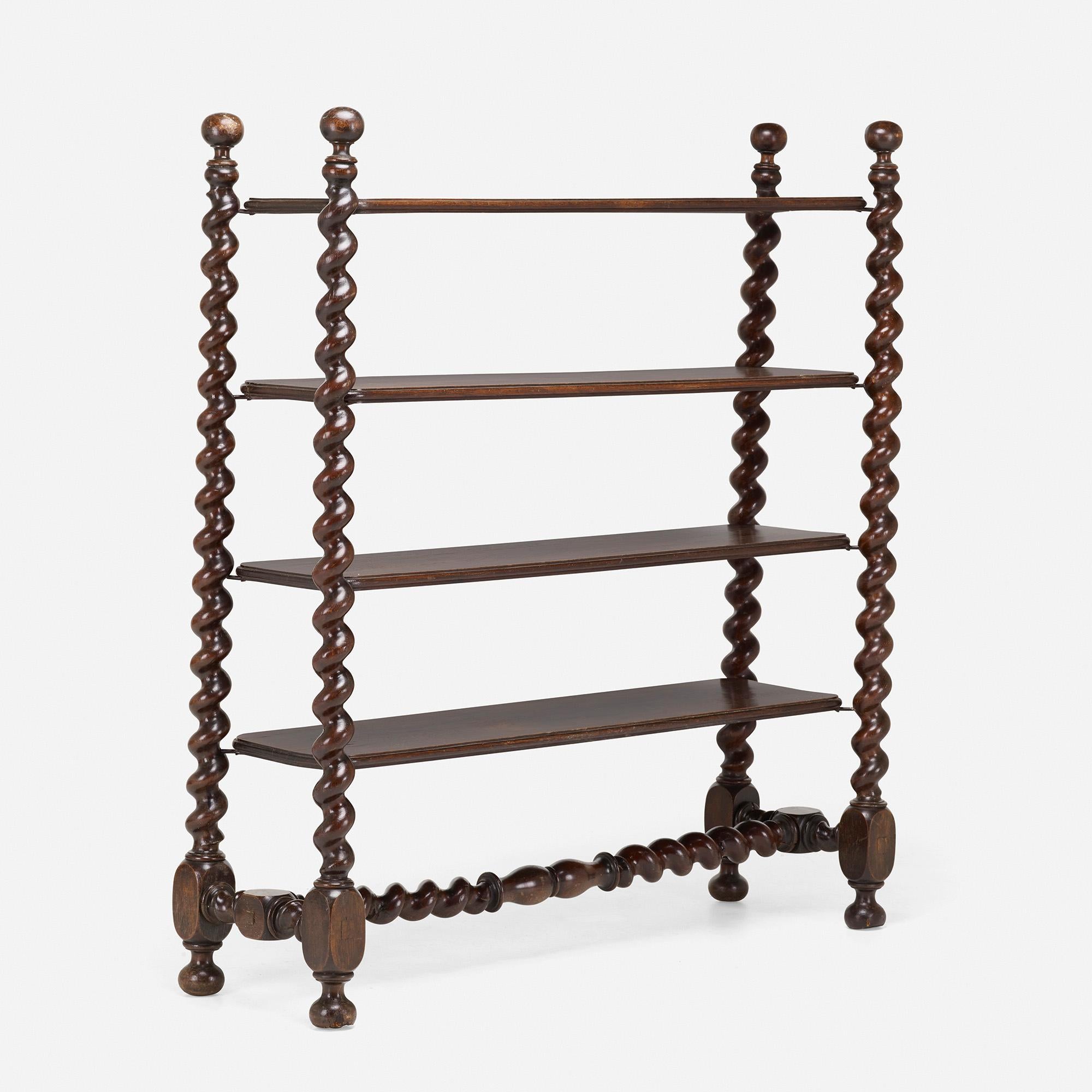 Created: c. 1900

Material: carved oak, enameled steel

Size: 61.5 W × 17 D × 71 H in

Description: Unit features four fixed shelves.