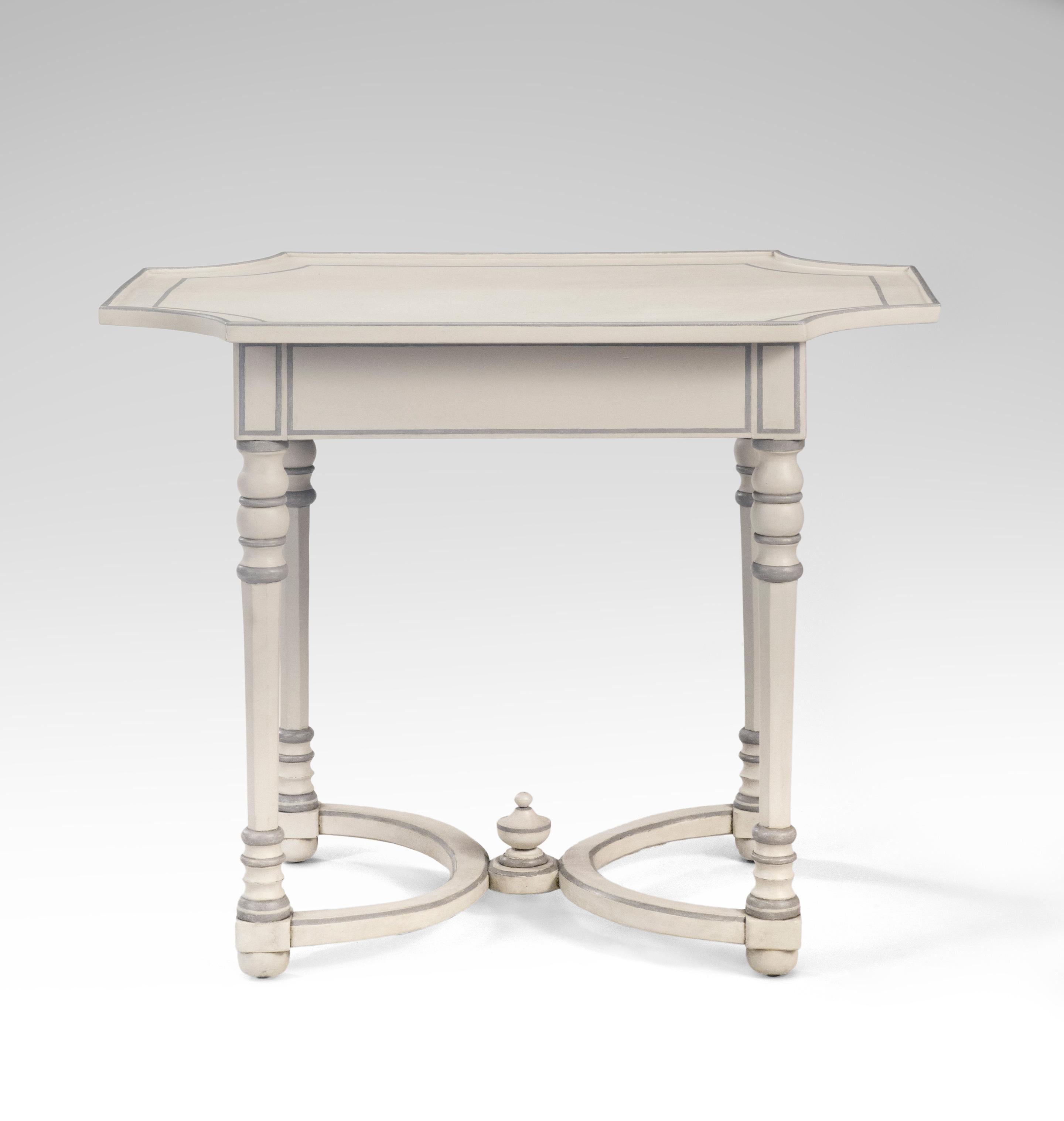 Continental Baroque gray painted table
18th century
Handsome, easy to live with table with an attractively shaped top; the predominate soft gray color accented with a darker gray accent line. The rectangular top with concave corners, above an