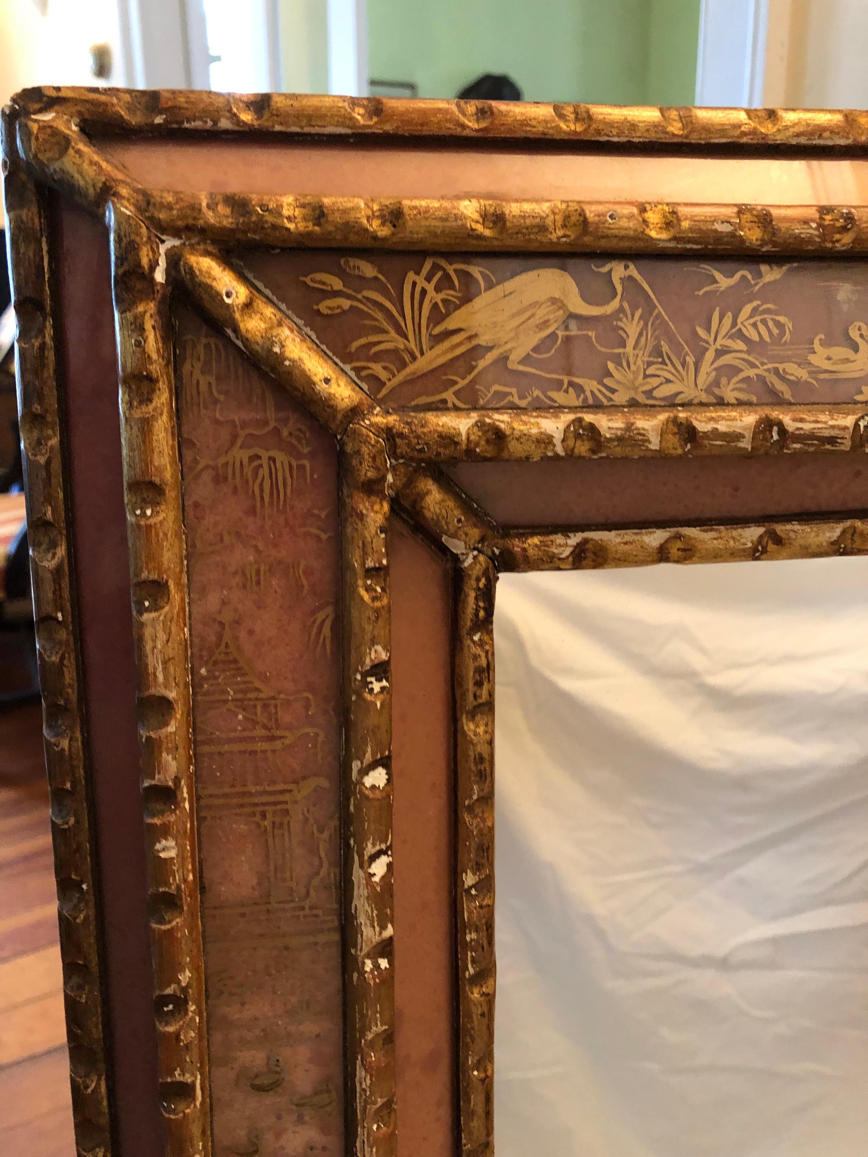 Late 19th Century Baroque Style Continental Reverse Rose Painted and Parcel-Gilt Mirror For Sale