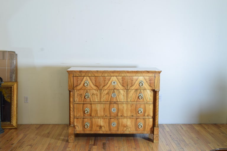 The body having one upper stepped drawer above three graduating drawers flanked by baluster shaped columns ending on Classic block-shaped feet.