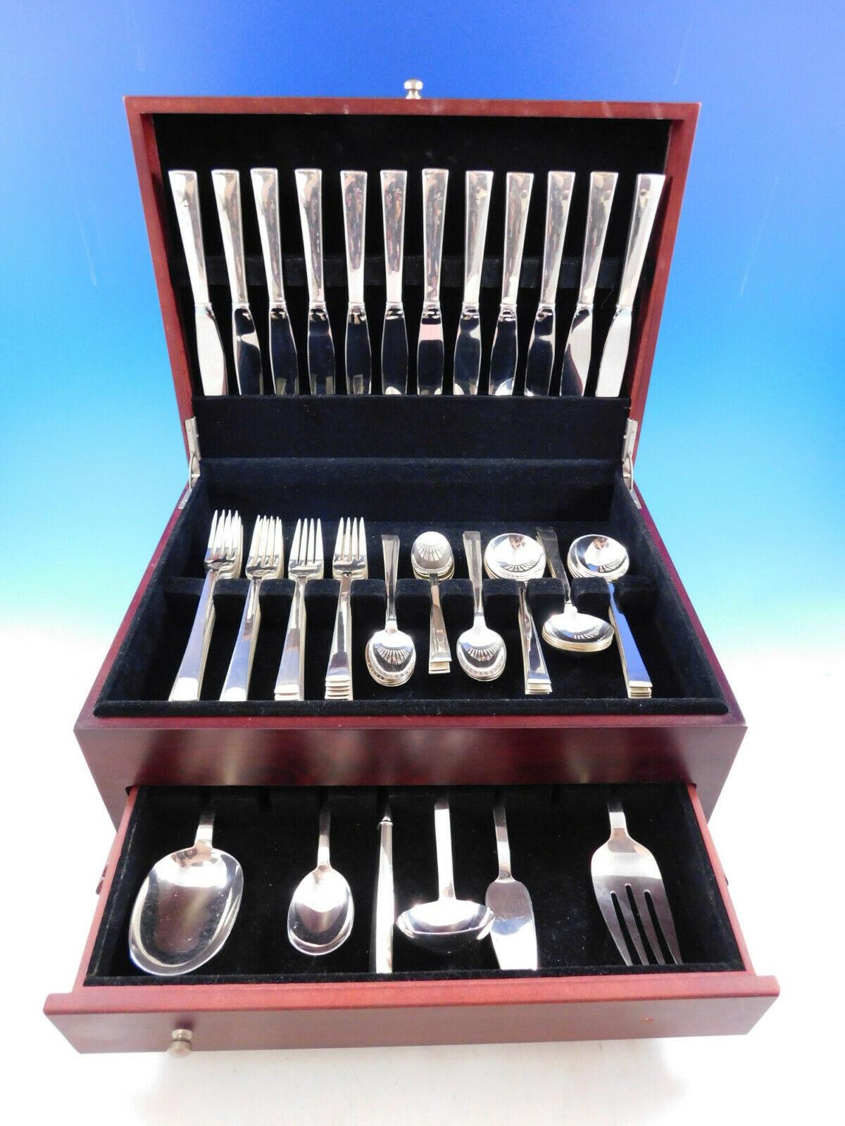 Continental is the perfect pattern choice for those who are looking for a highly polished, clean, contemporary look.

Continental By International Sterling Silver flatware set - 66 pieces. This set includes:

12 Regular Knives, 8 7/8