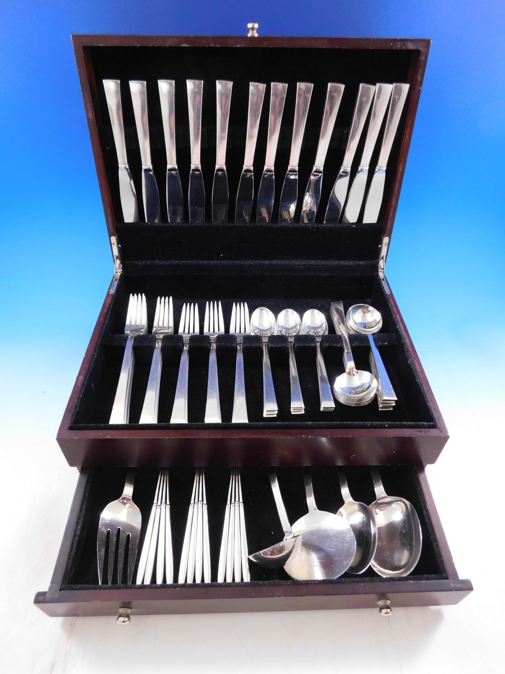 Continental is the perfect pattern choice for those who are looking for a highly polished, clean, contemporary look.

Continental by International sterling silver flatware set, 77 pieces. This set includes:

12 regular knives, 8 3/4