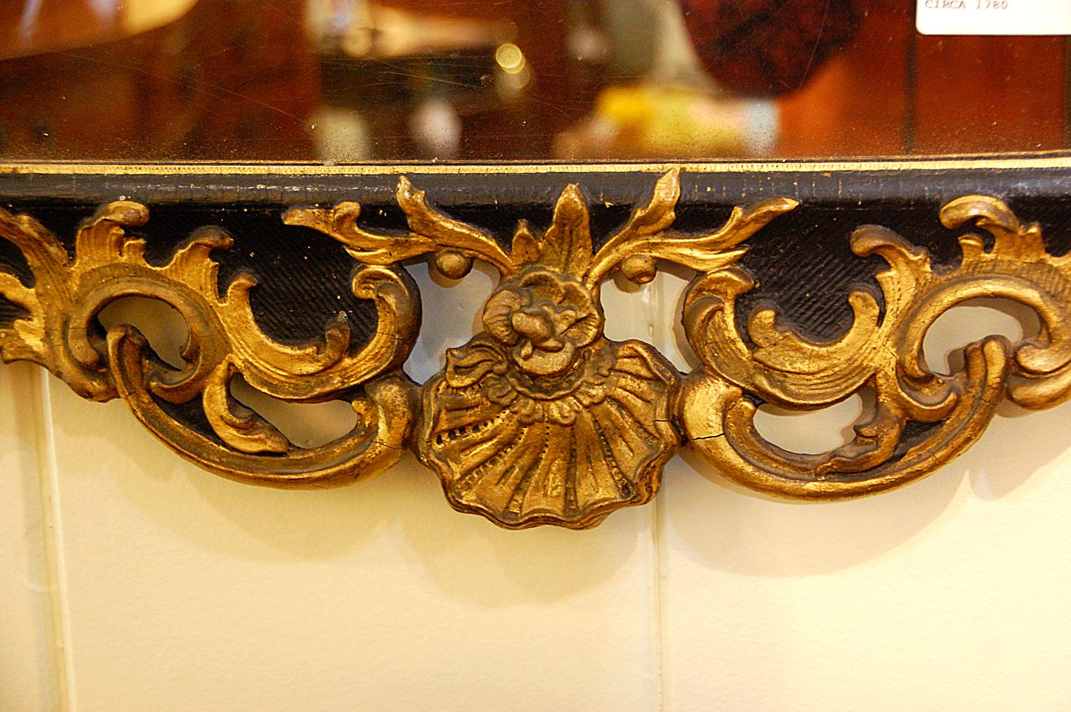 Continental Carved Early 19th Century Parcel-Gilt Mirror Leaf and Shell on Black In Good Condition In Wells, ME