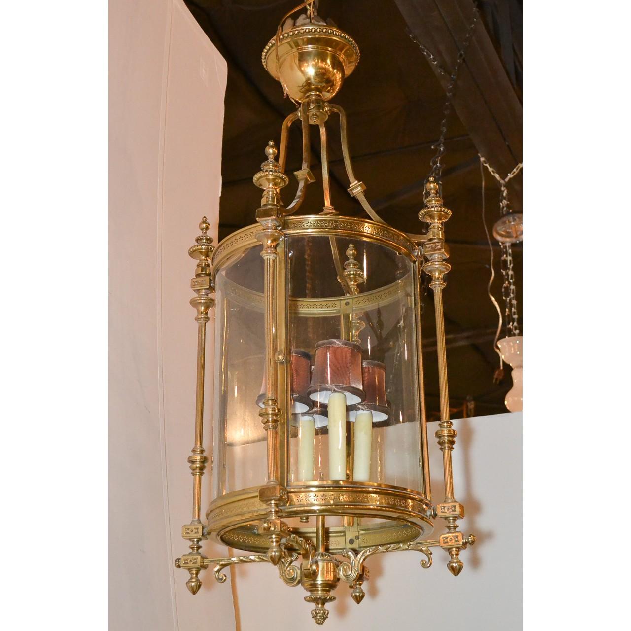Early 20th century cast brass hall lantern with glass encasing 4 lights.
We will supply 3 feet of chain and canopy.
Made in Europe, circa 1920.
17 inches wide x 36 inches height.