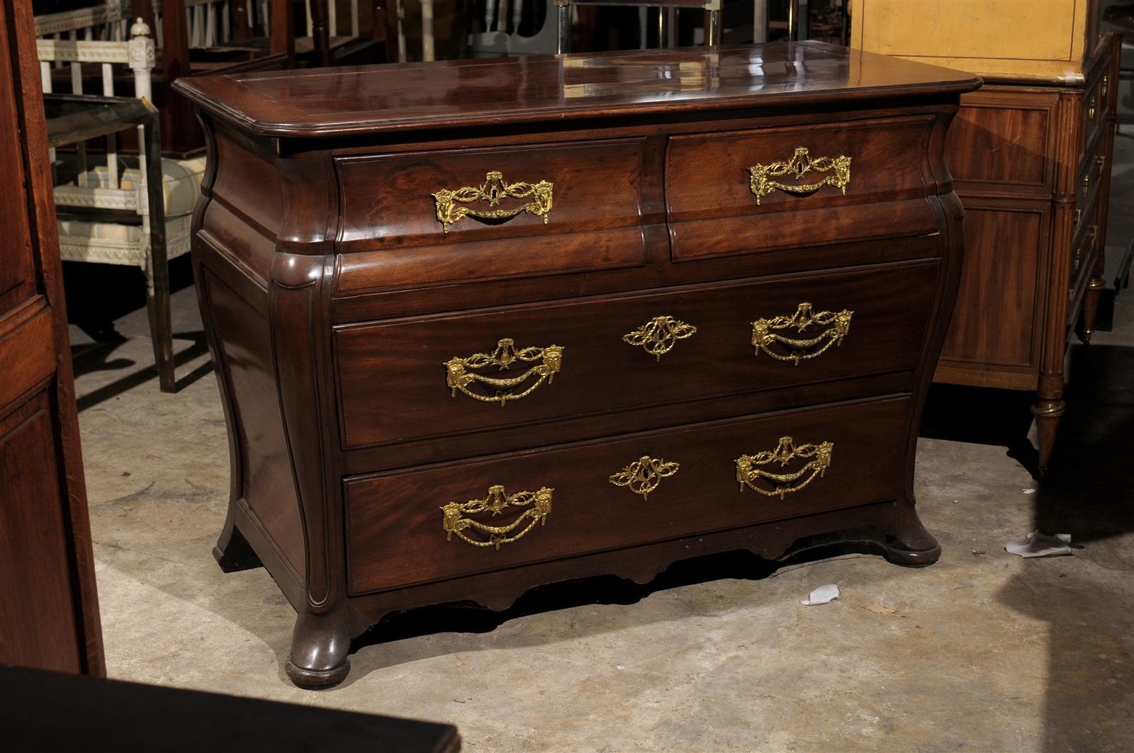 18th century French walnut bombe commode with incredible brass pulls
Four drawers
Beautiful lines.