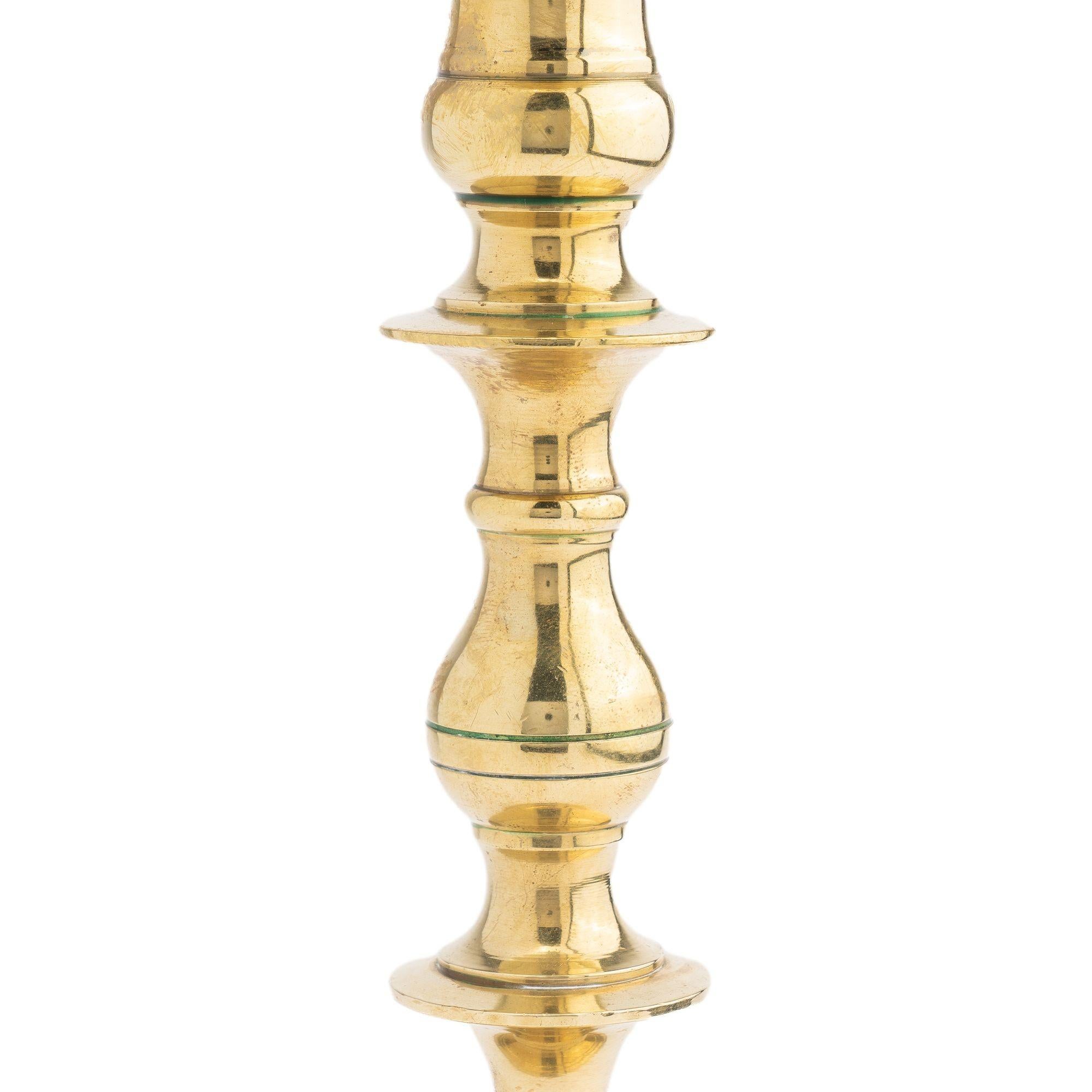 Brass Continental core cast brass candlestick, 1700's For Sale